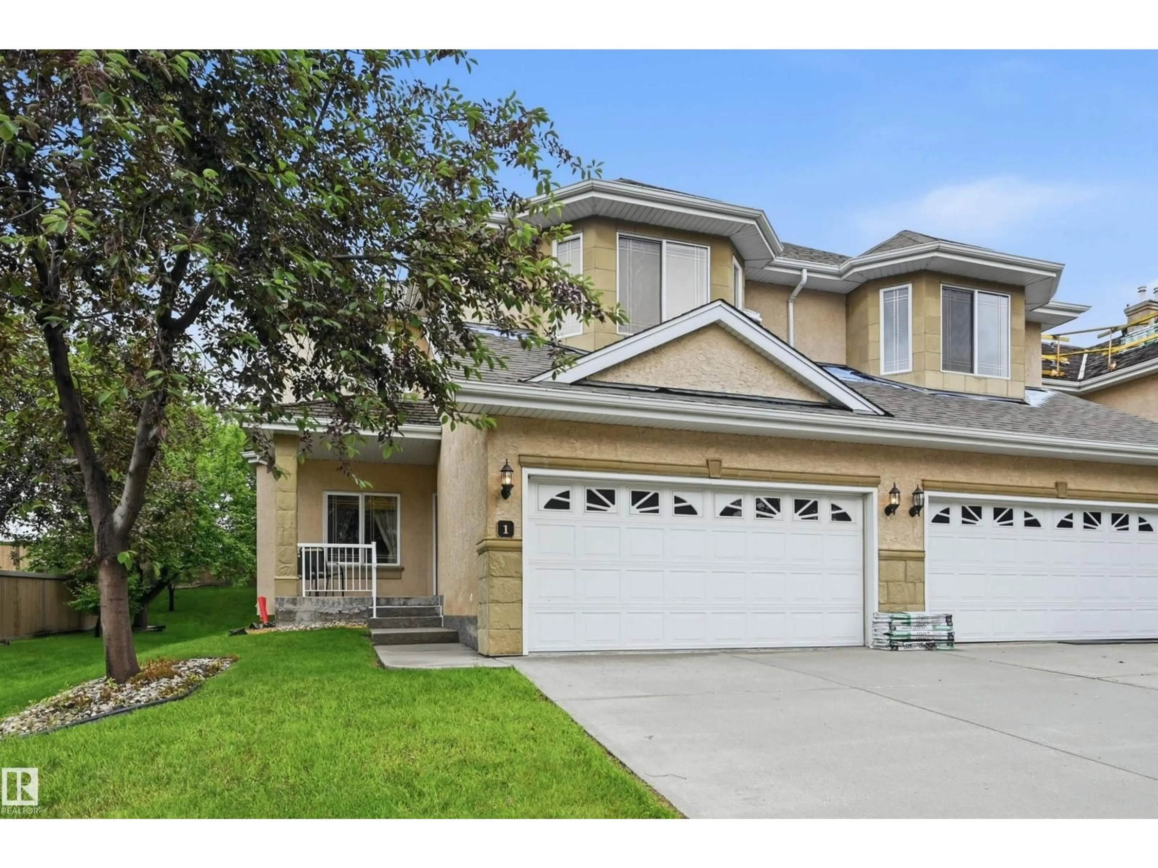Home with vinyl exterior material, street for 577 BUTTERWORTH WY, Edmonton Alberta T6R2Y2