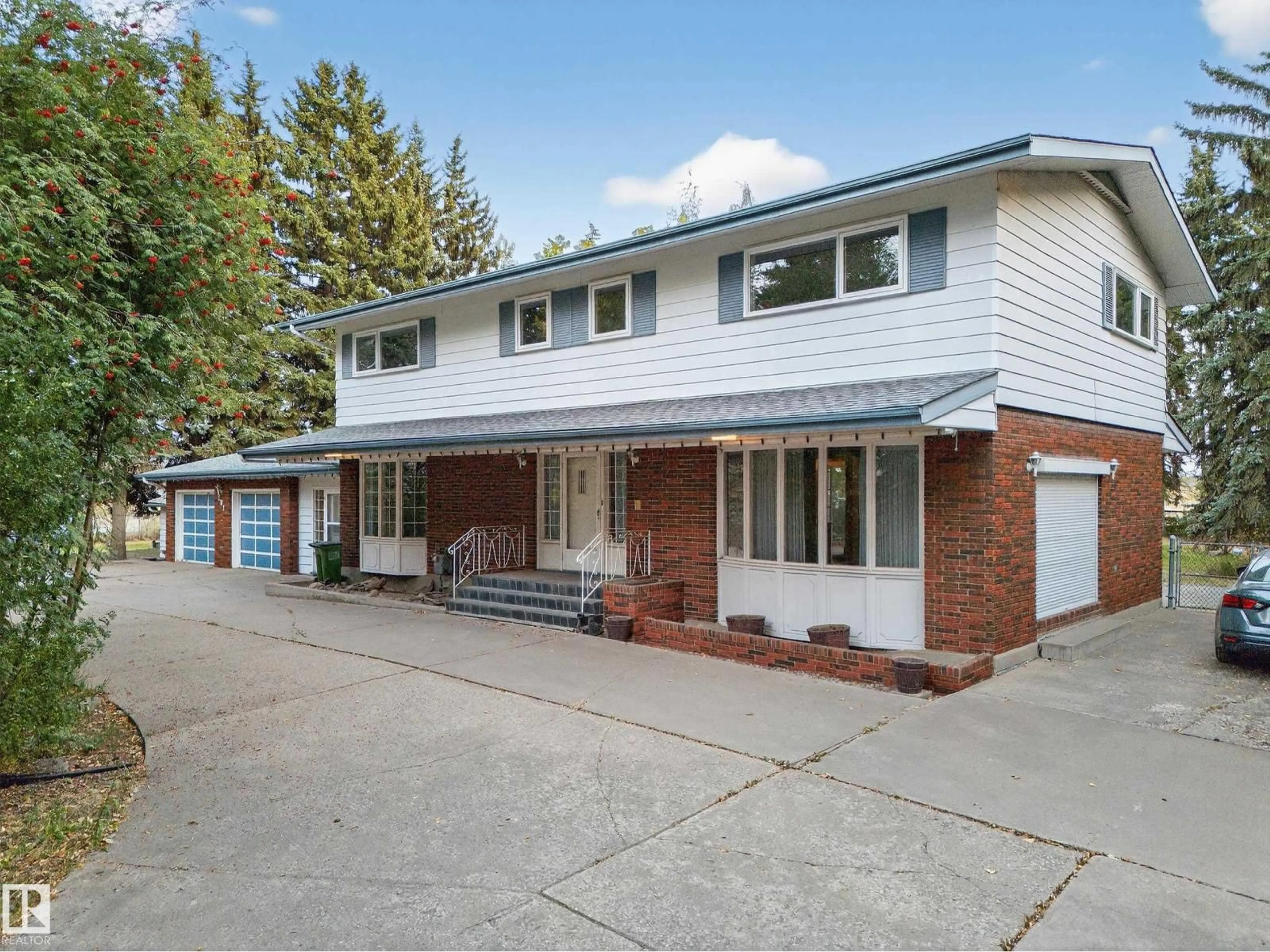 Home with brick exterior material, street for 707 65 AV, Edmonton Alberta T6P1S1