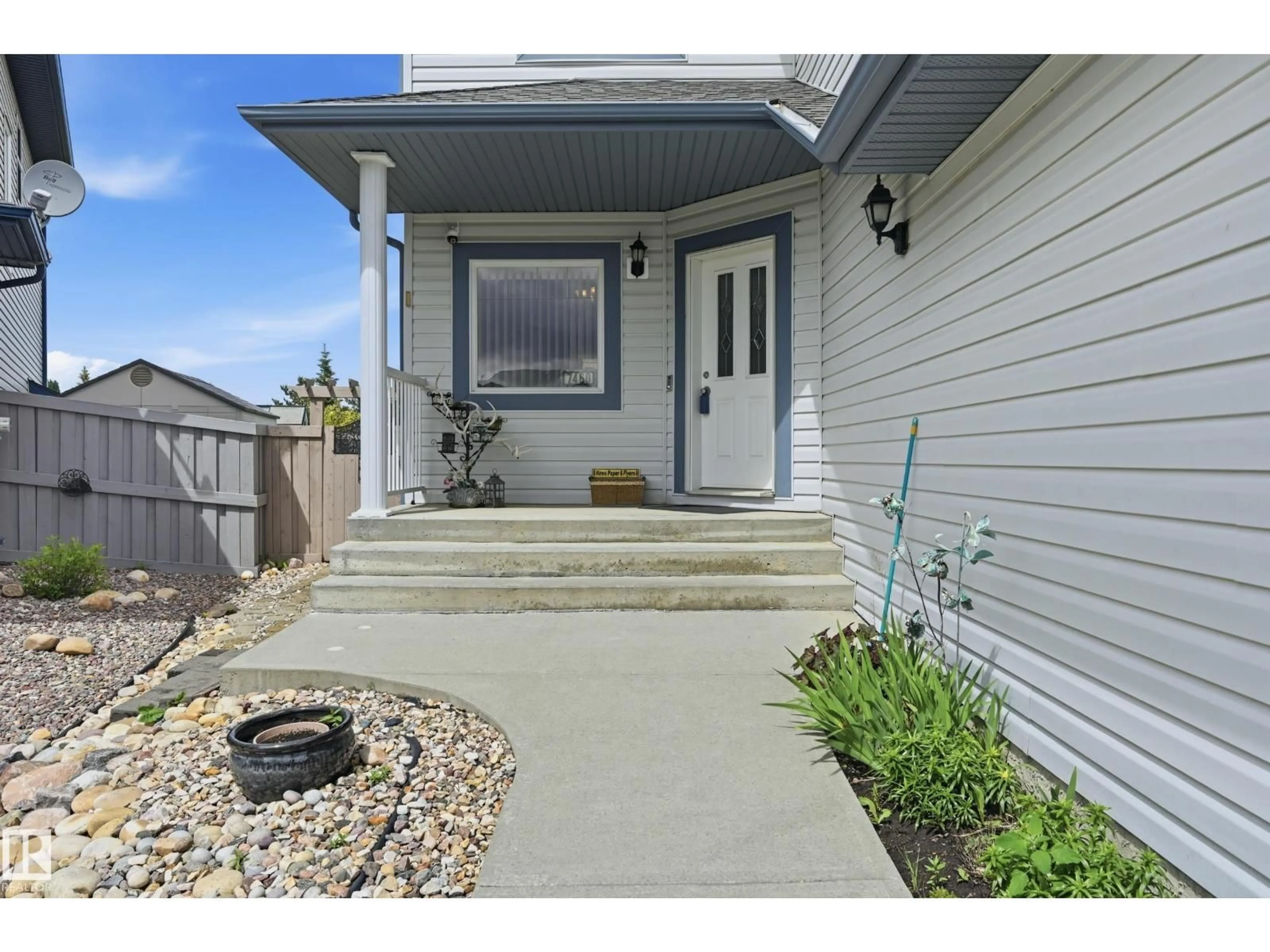 Home with vinyl exterior material, street for NW - 7460 SINGER LD, Edmonton Alberta T6R3S3