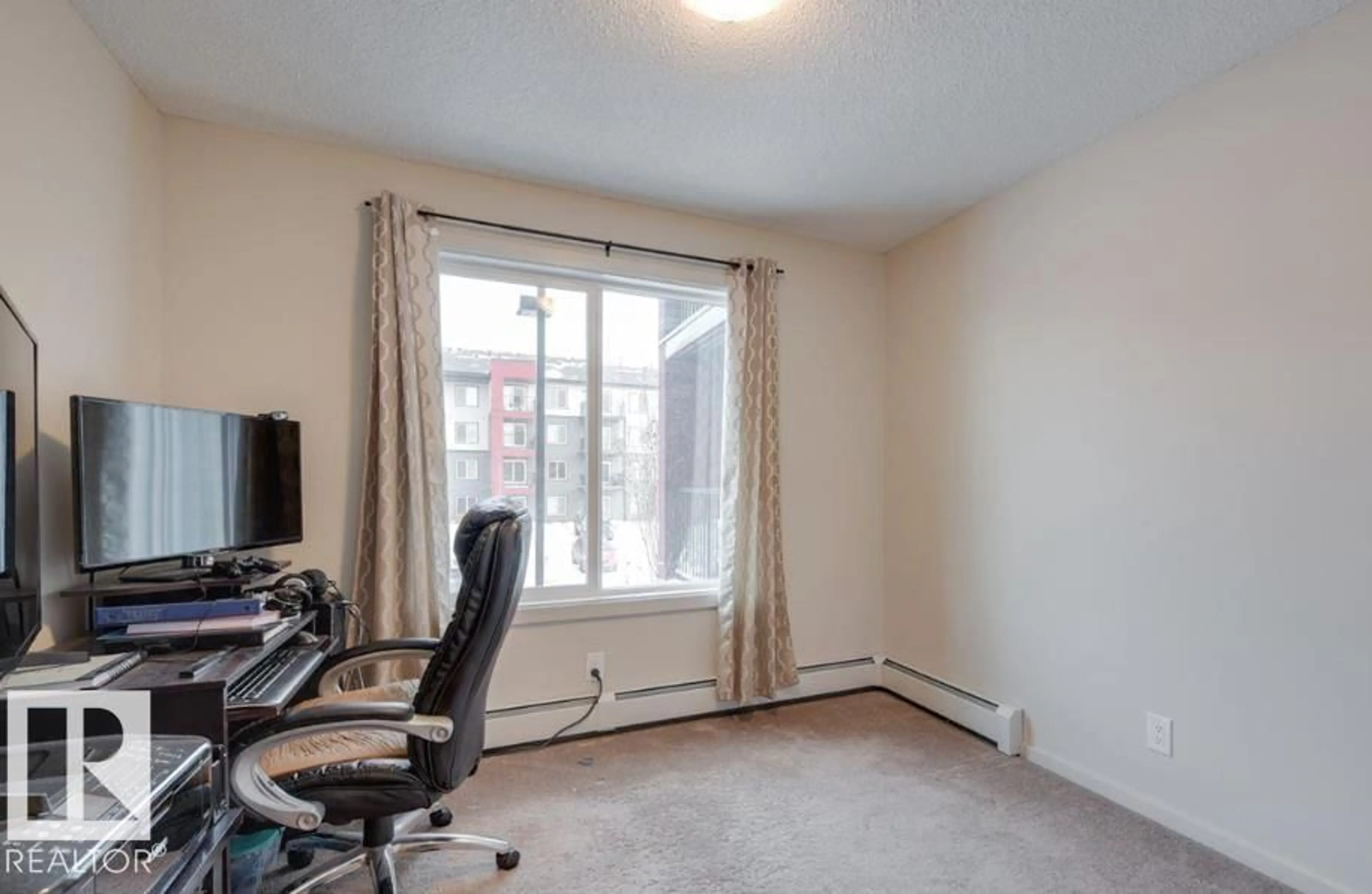A pic of a room for 207 - 5521 7 AV SW, Edmonton Alberta T6X2A8