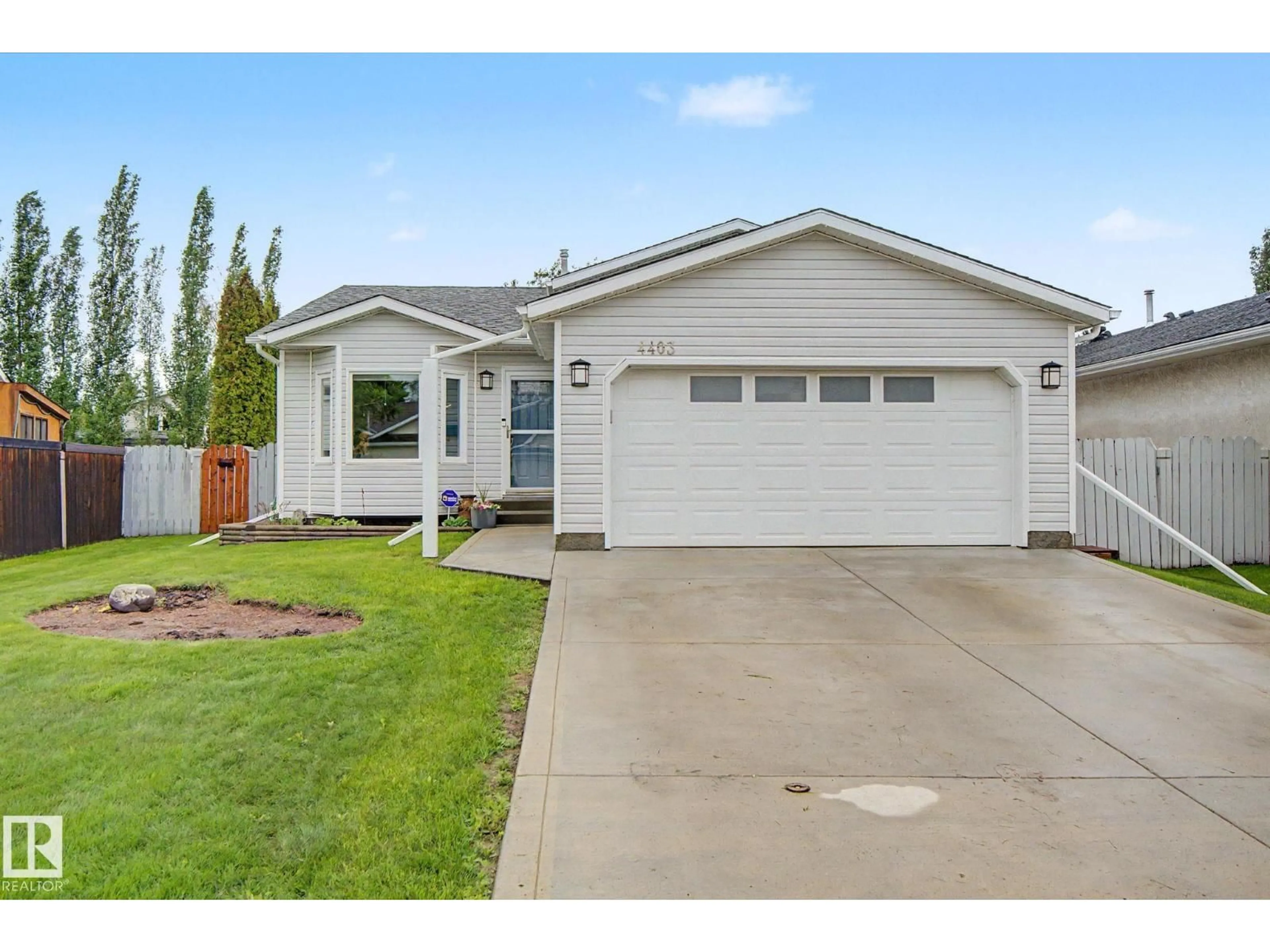 Home with vinyl exterior material, street for 4403 43 ST, Beaumont Alberta T4X1G8