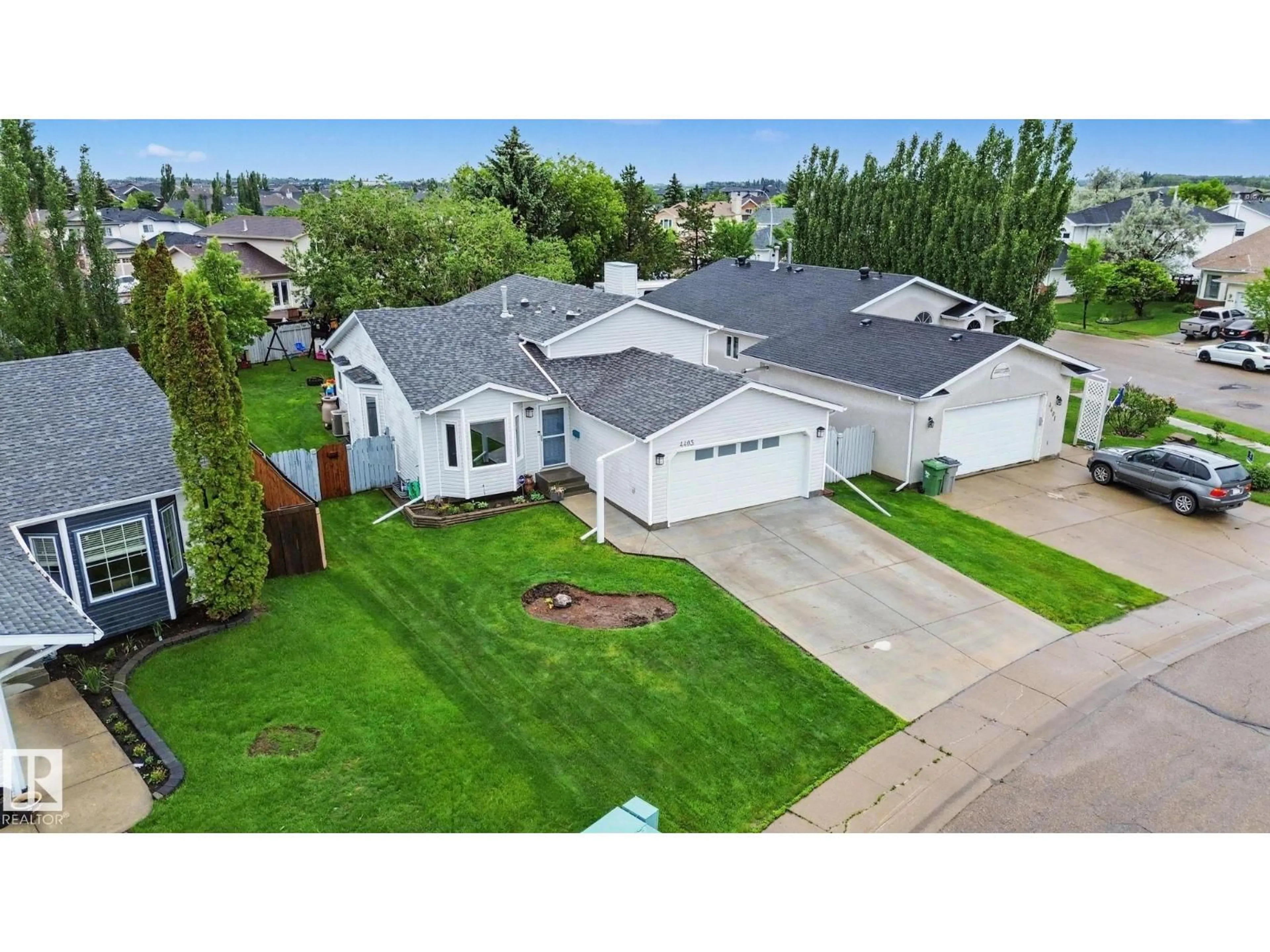 A pic from outside/outdoor area/front of a property/back of a property/a pic from drone, street for 4403 43 ST, Beaumont Alberta T4X1G8