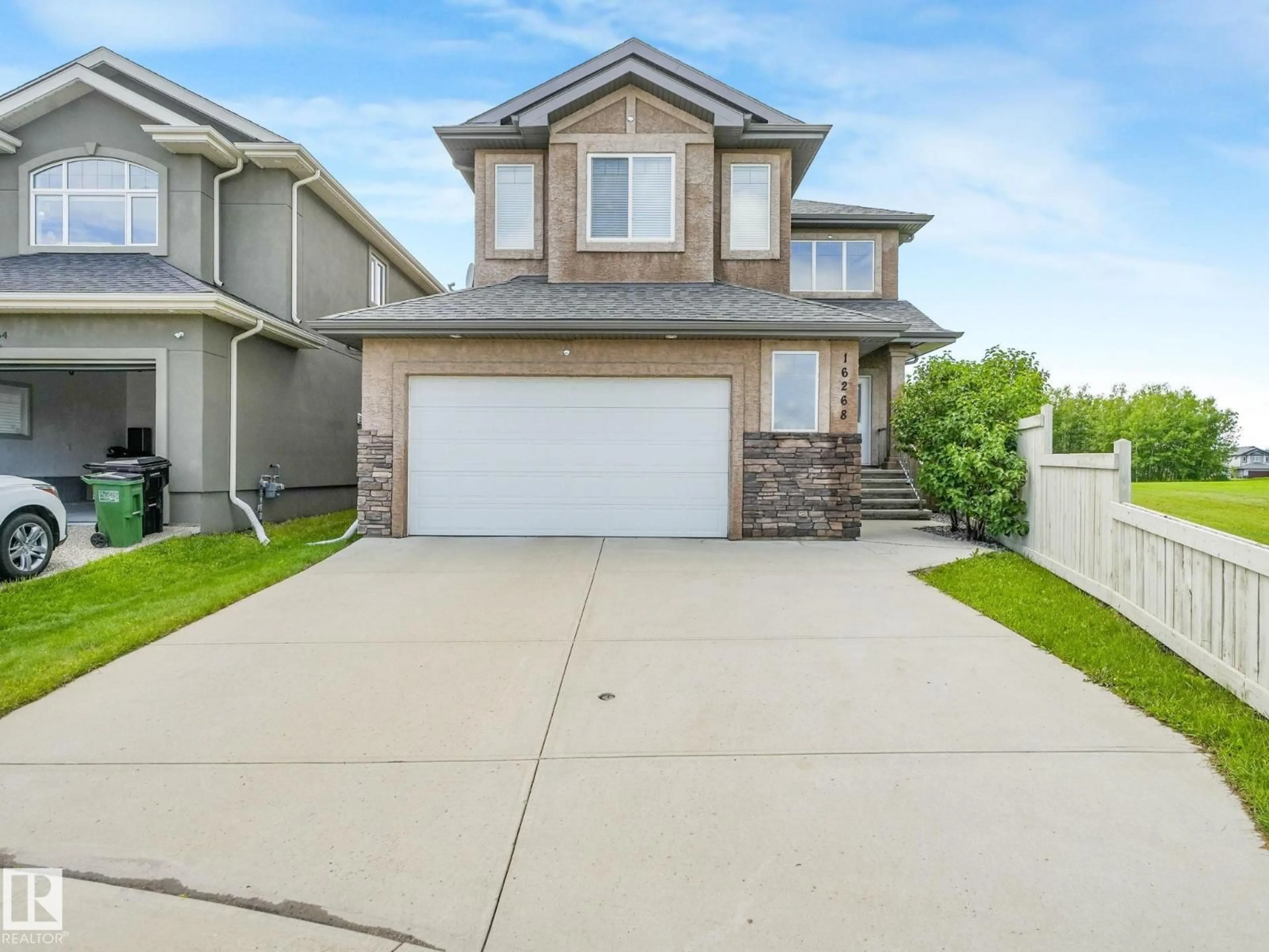 Home with vinyl exterior material, street for NW - 16268 137 ST, Edmonton Alberta T6V0J7