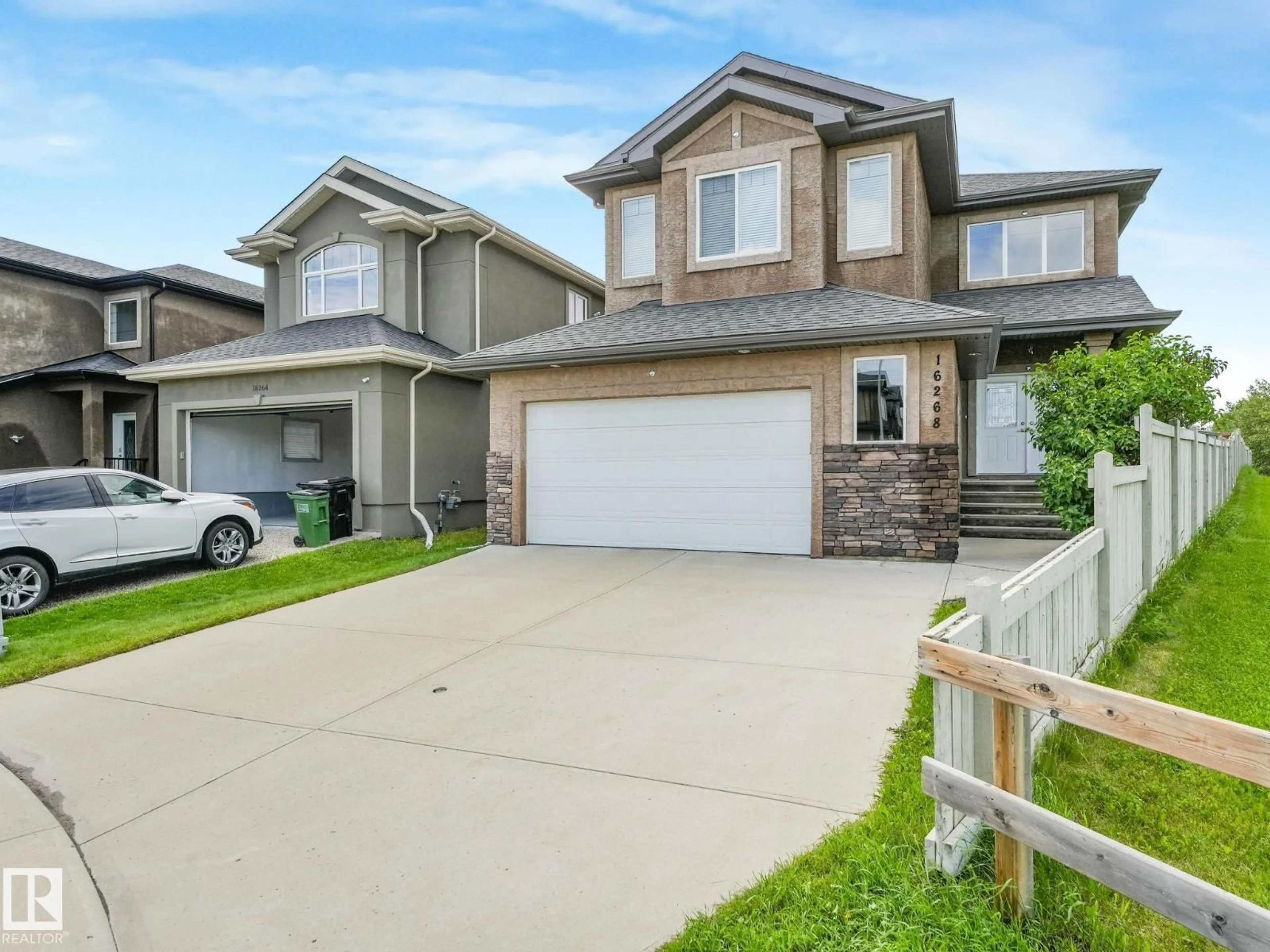 Home with vinyl exterior material, street for NW - 16268 137 ST, Edmonton Alberta T6V0J7