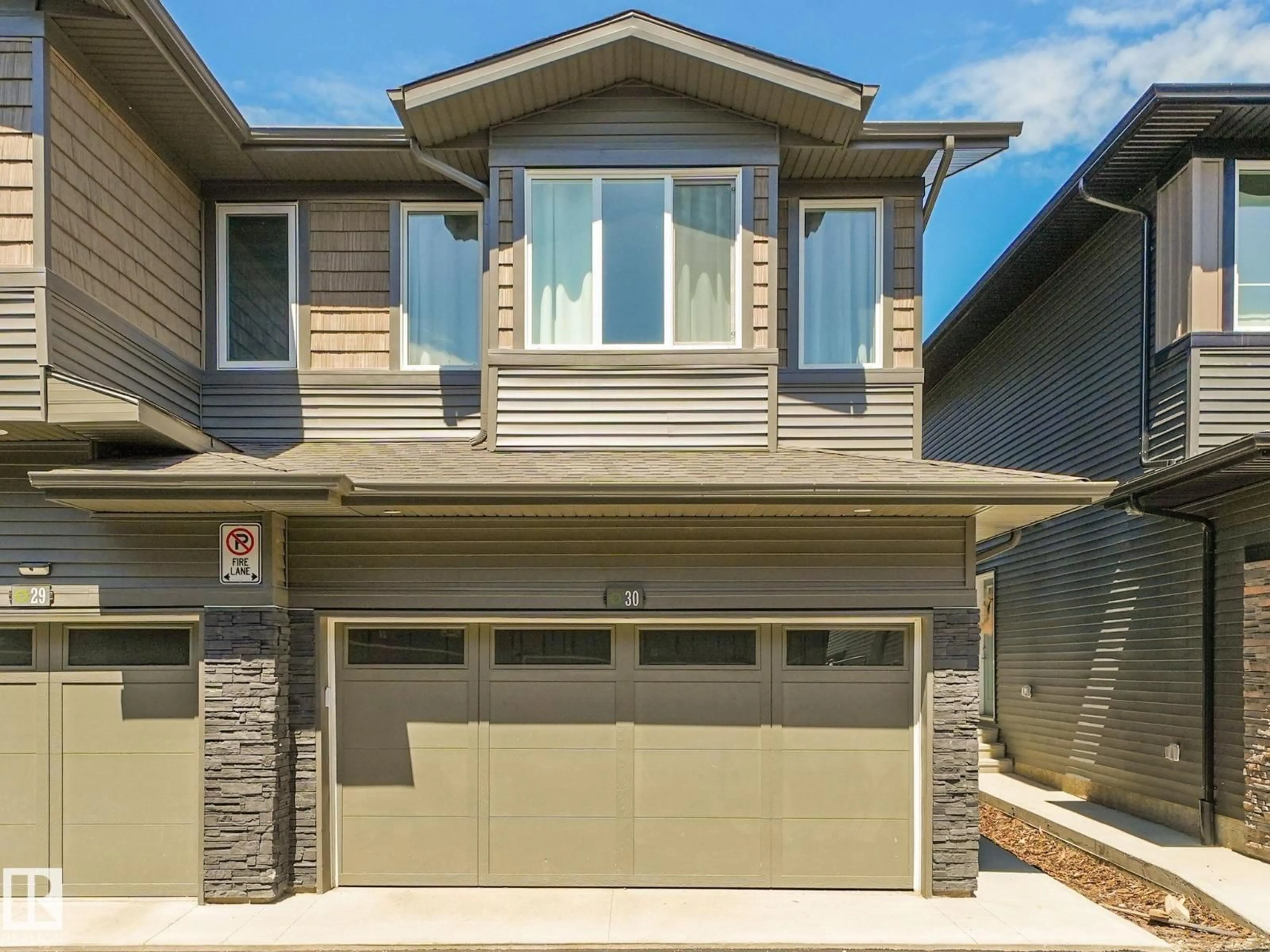 Home with vinyl exterior material, street for #30 - 2710 66 ST, Edmonton Alberta T6X3H4