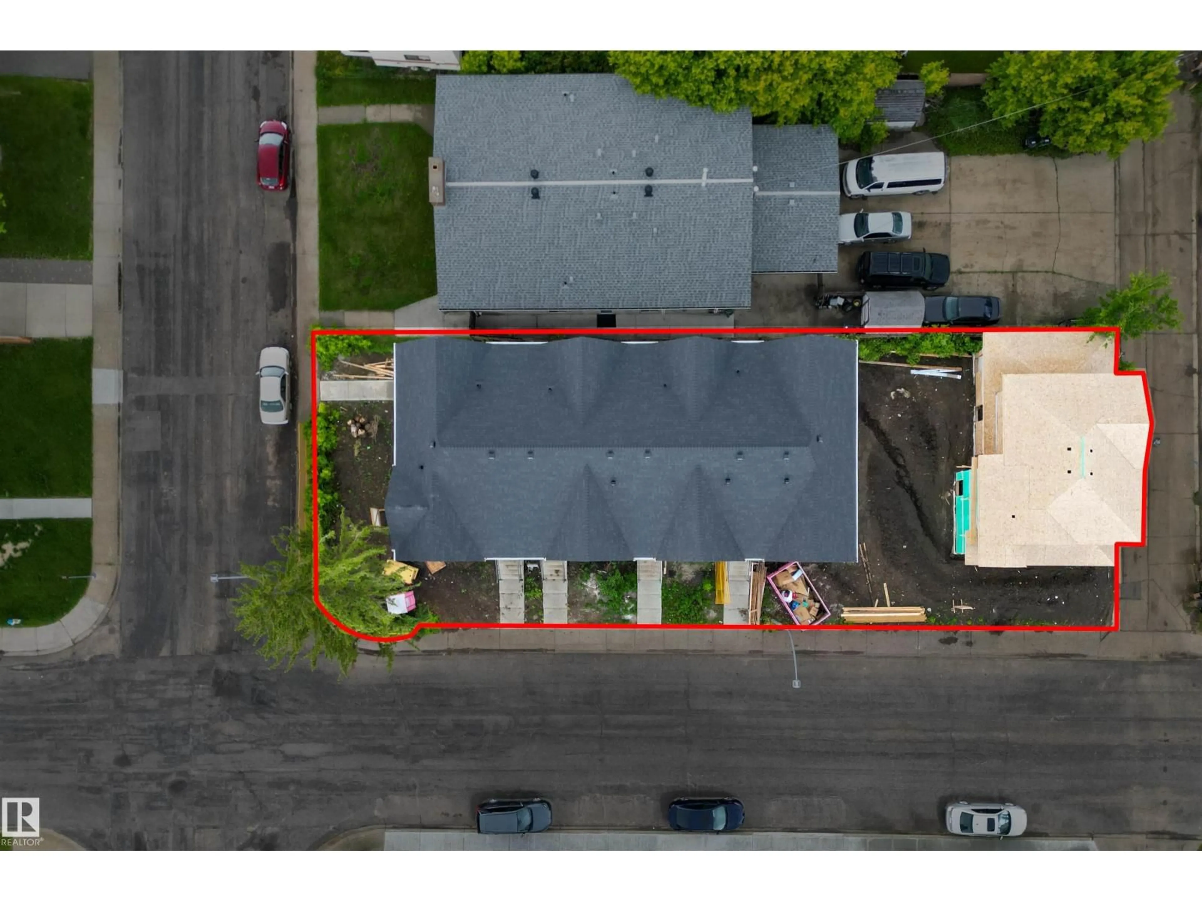 A pic from outside/outdoor area/front of a property/back of a property/a pic from drone, street for 14930 94 AV, Edmonton Alberta T5R1G8