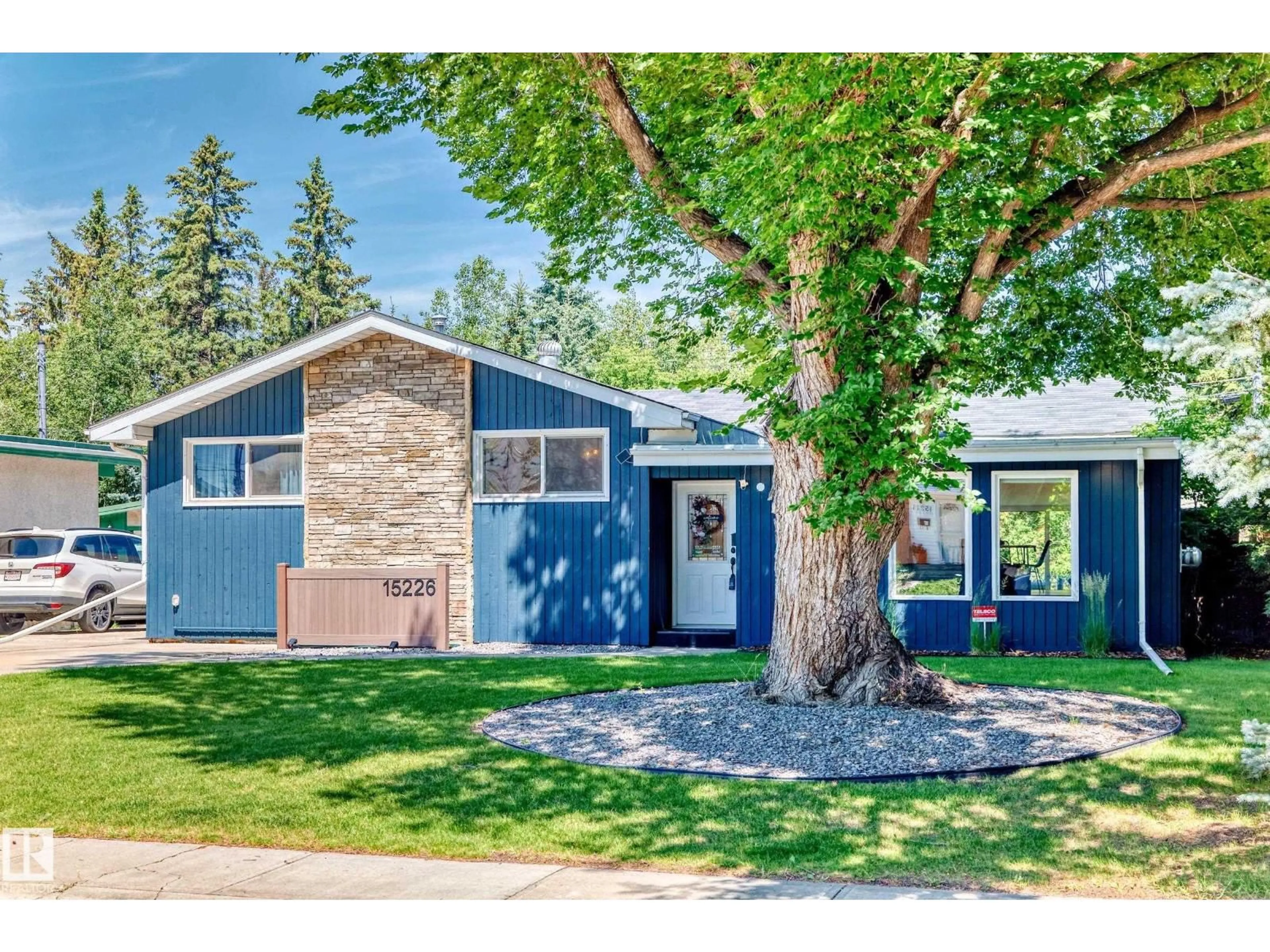 Home with vinyl exterior material, street for 15226 81 AV, Edmonton Alberta T5R3P1