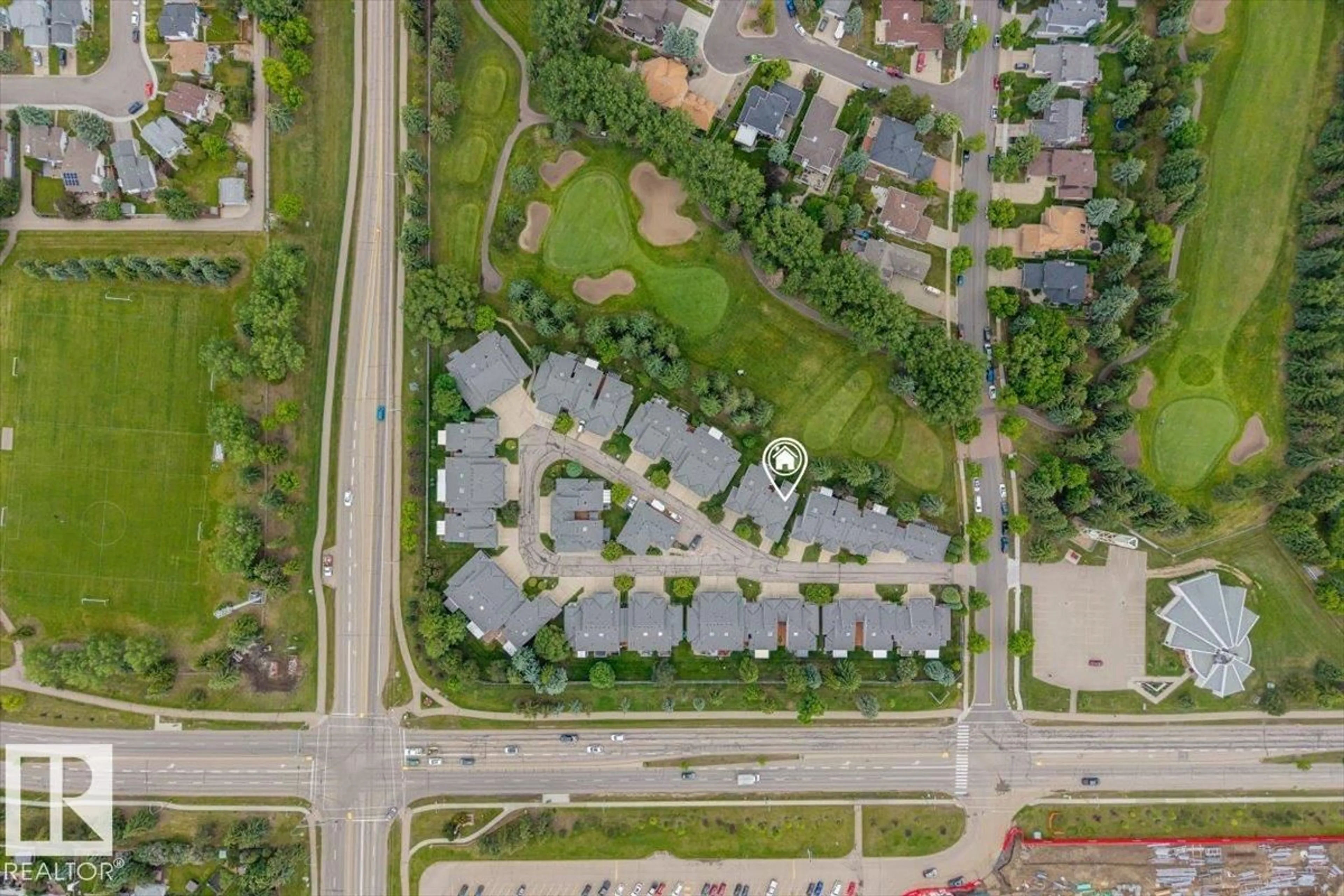 A pic from outside/outdoor area/front of a property/back of a property/a pic from drone, street for 2A - 5 FIELDSTONE DR, Spruce Grove Alberta T7X3E7