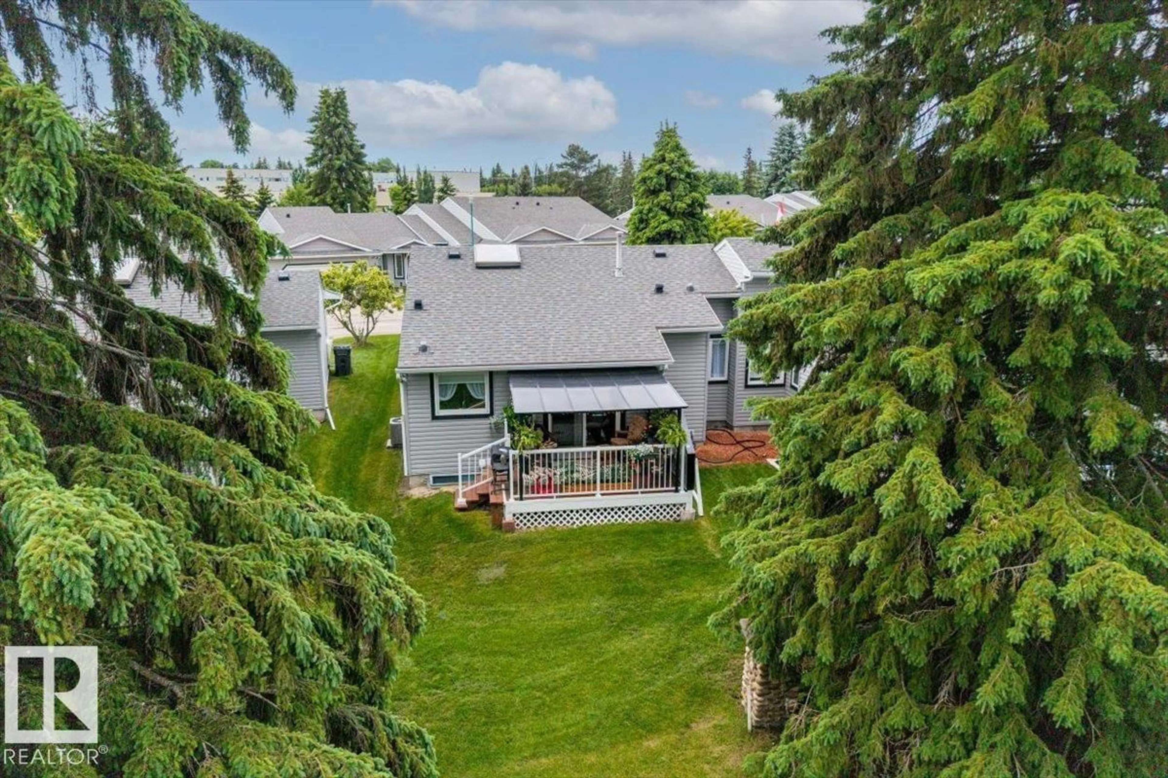 A pic from outside/outdoor area/front of a property/back of a property/a pic from drone, mountain view for 2A - 5 FIELDSTONE DR, Spruce Grove Alberta T7X3E7