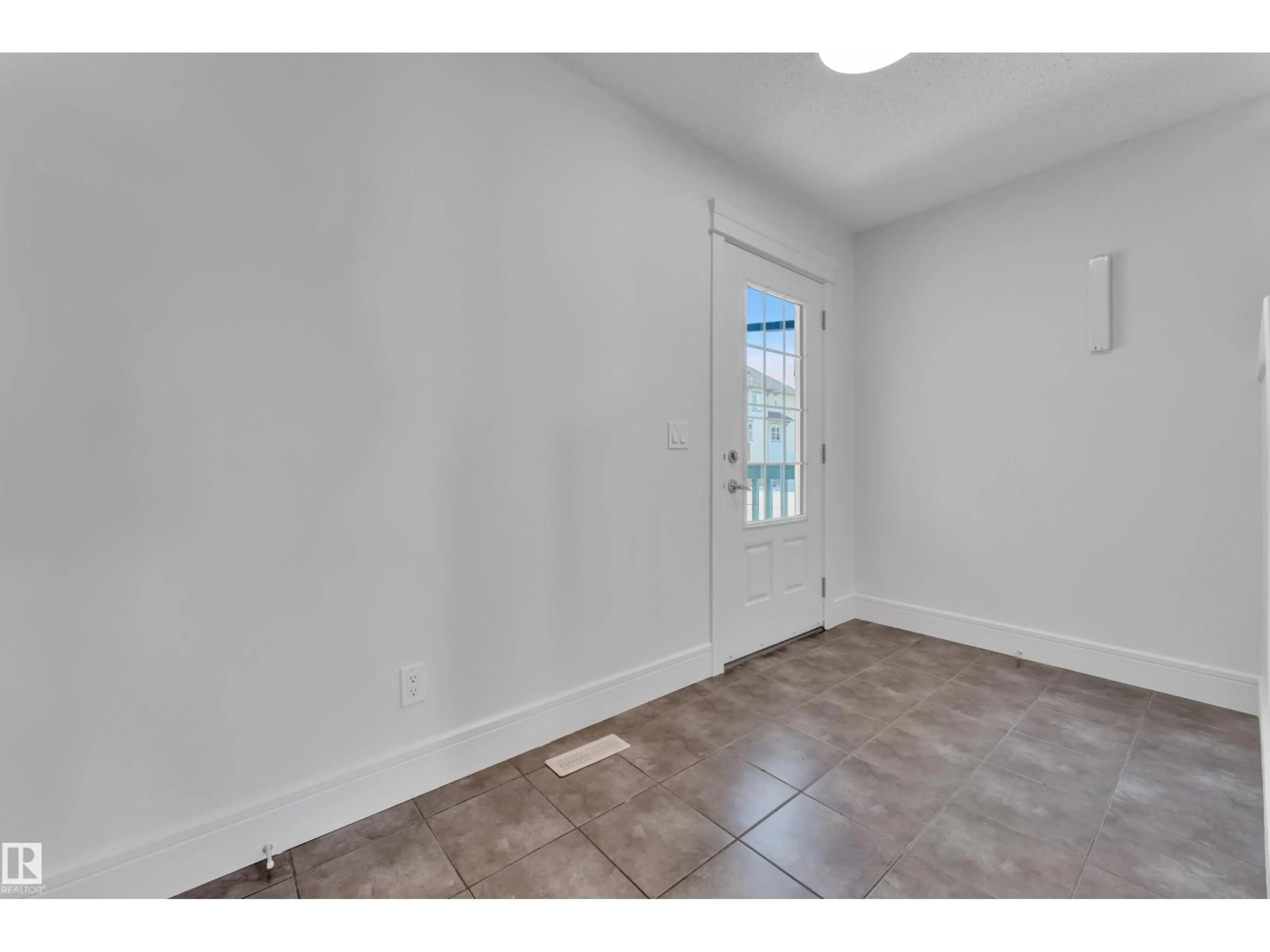 Indoor entryway for 6156 11 AV, Edmonton Alberta T6X0M4