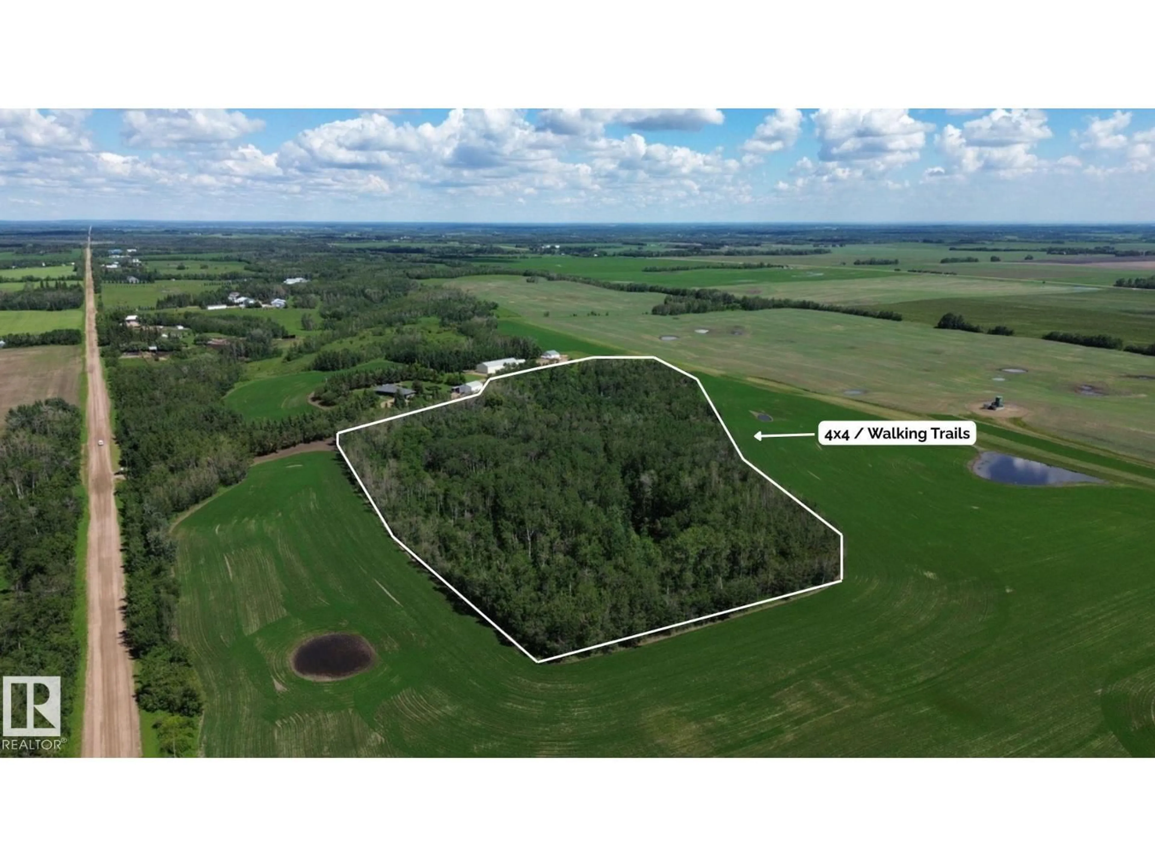A pic from outside/outdoor area/front of a property/back of a property/a pic from drone, forest/trees view for 56407 RGE ROAD 240, Rural Sturgeon County Alberta T0A0K2