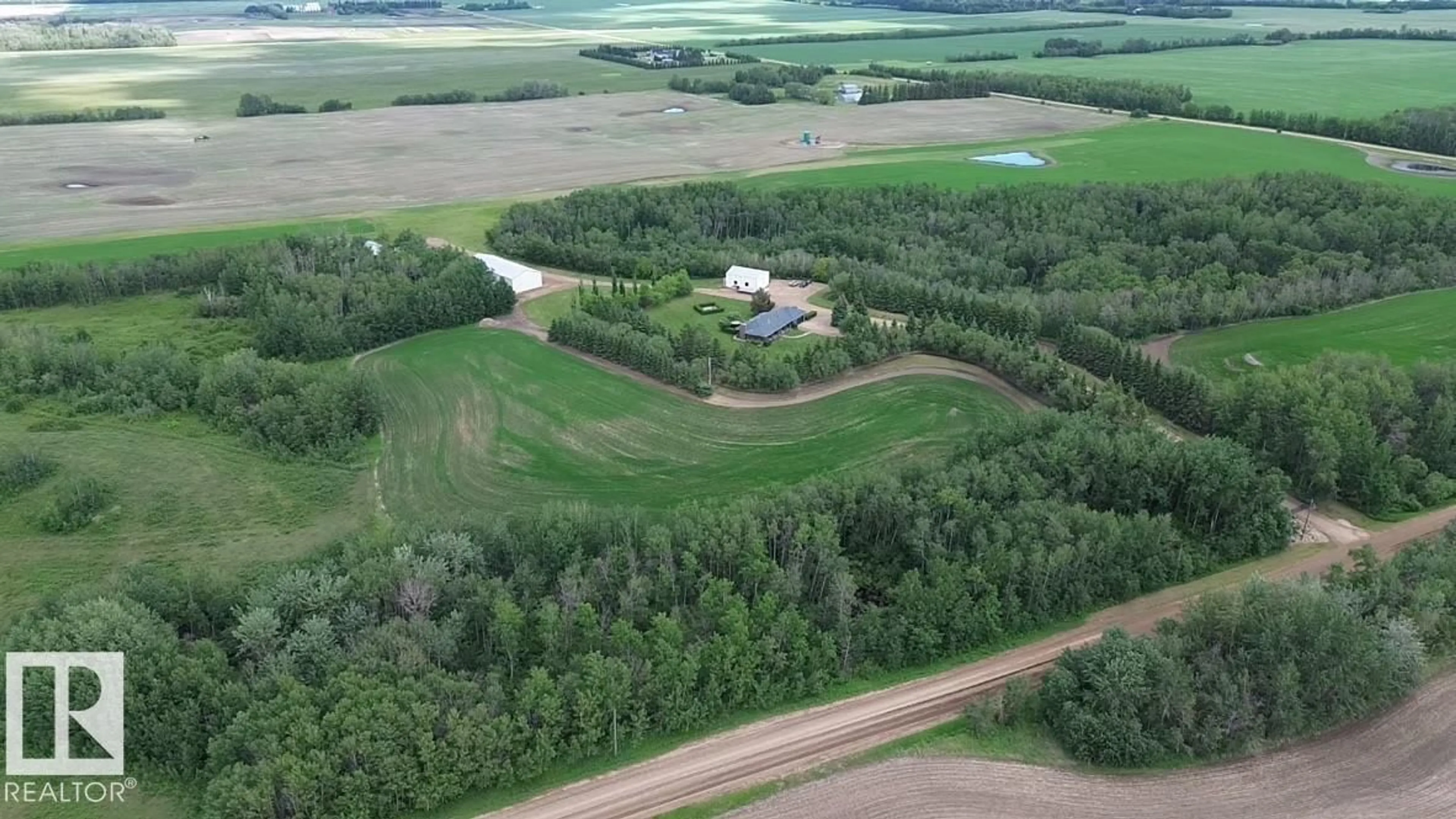 A pic from outside/outdoor area/front of a property/back of a property/a pic from drone, unknown for 56407 RGE ROAD 240, Rural Sturgeon County Alberta T0A0K2