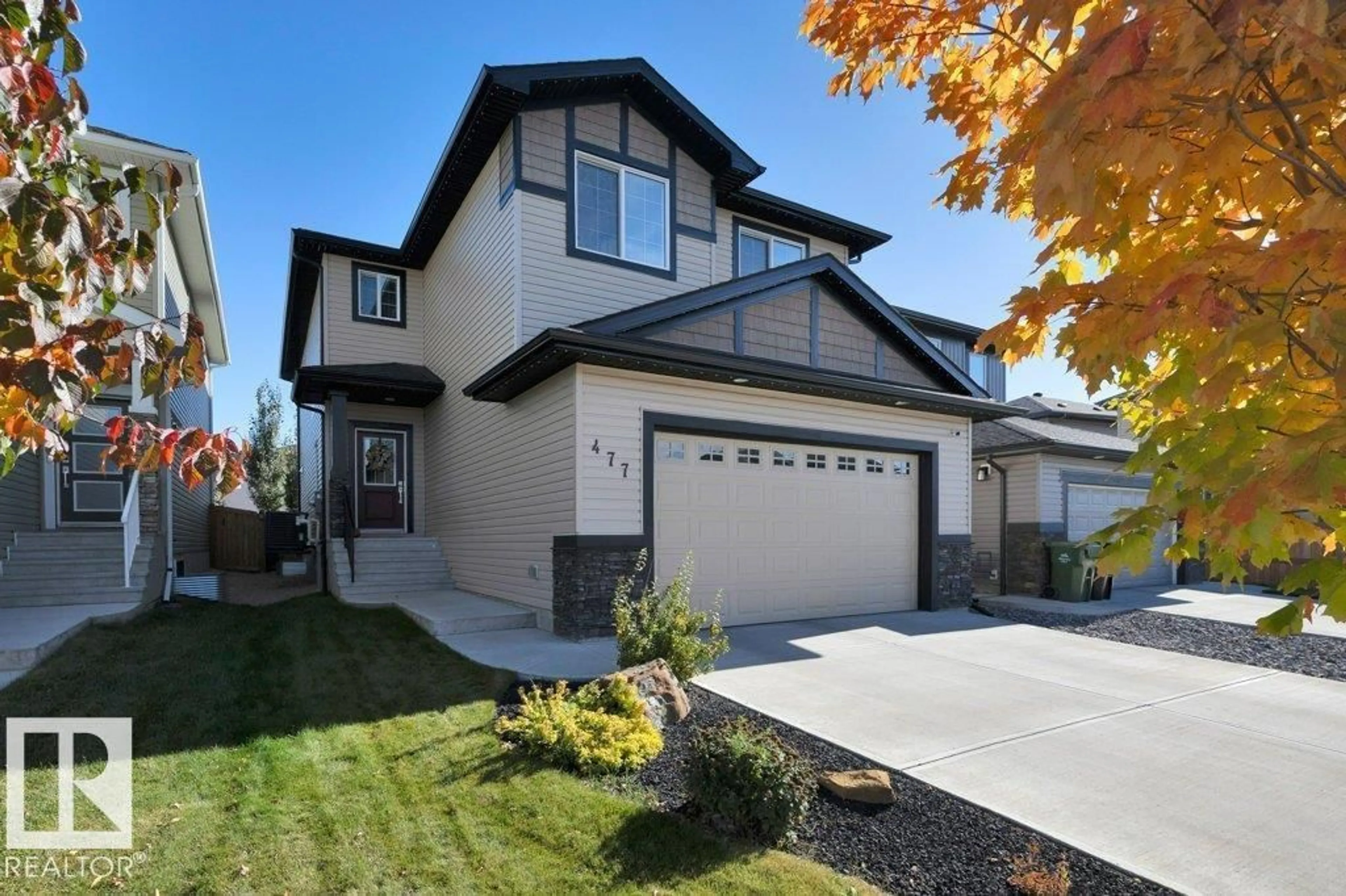 Home with vinyl exterior material, street for 477 ROBERTS CR, Leduc Alberta T9E1K9