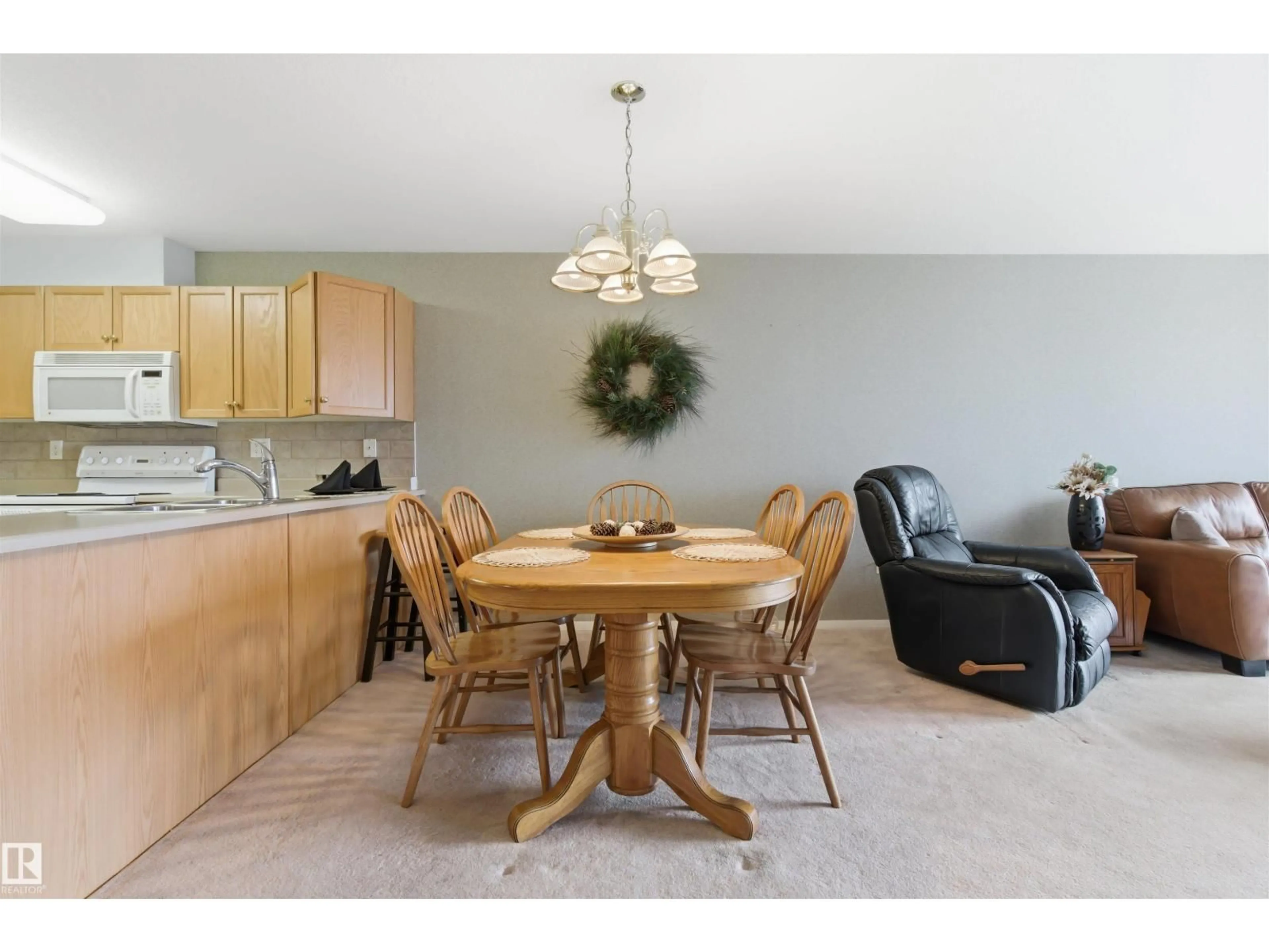Dining room, wood/laminate floor for #309 - 8912 156 ST, Edmonton Alberta T5R5Z2