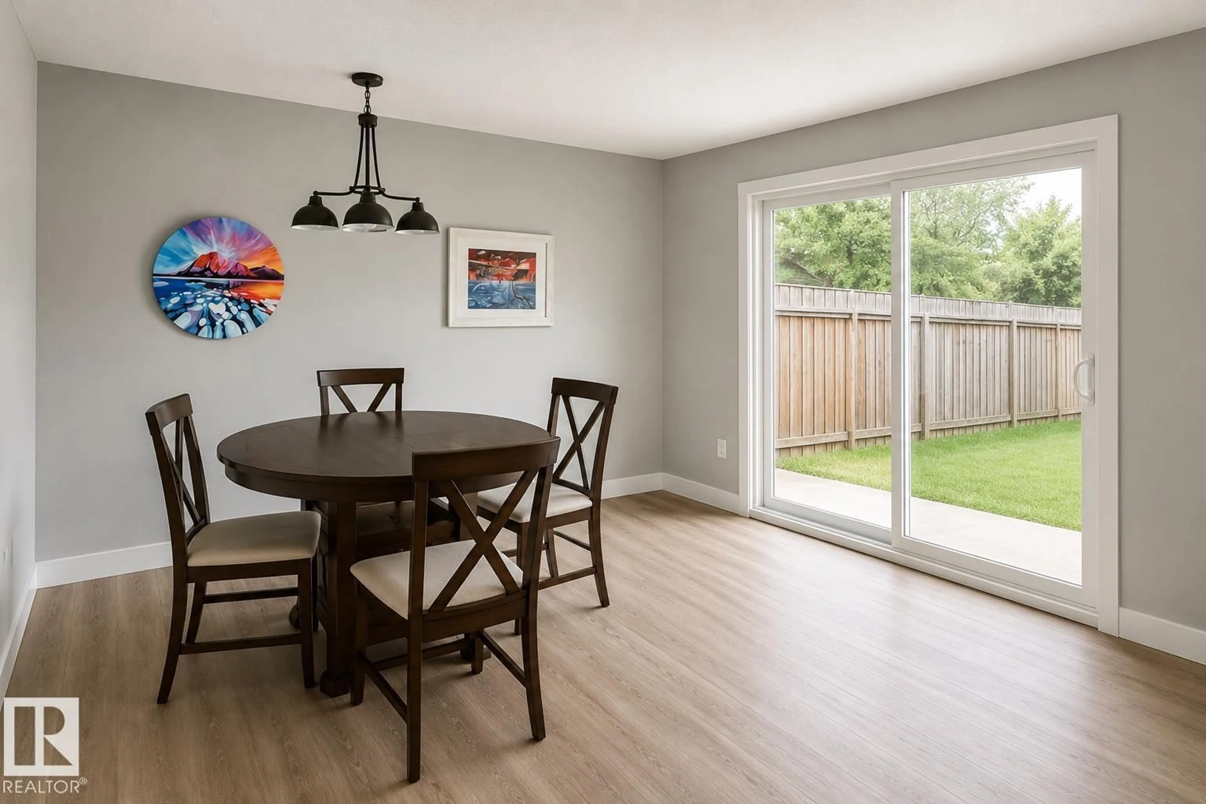Dining room, wood/laminate floor for 6348 180ST NW, Edmonton Alberta T5T2J6