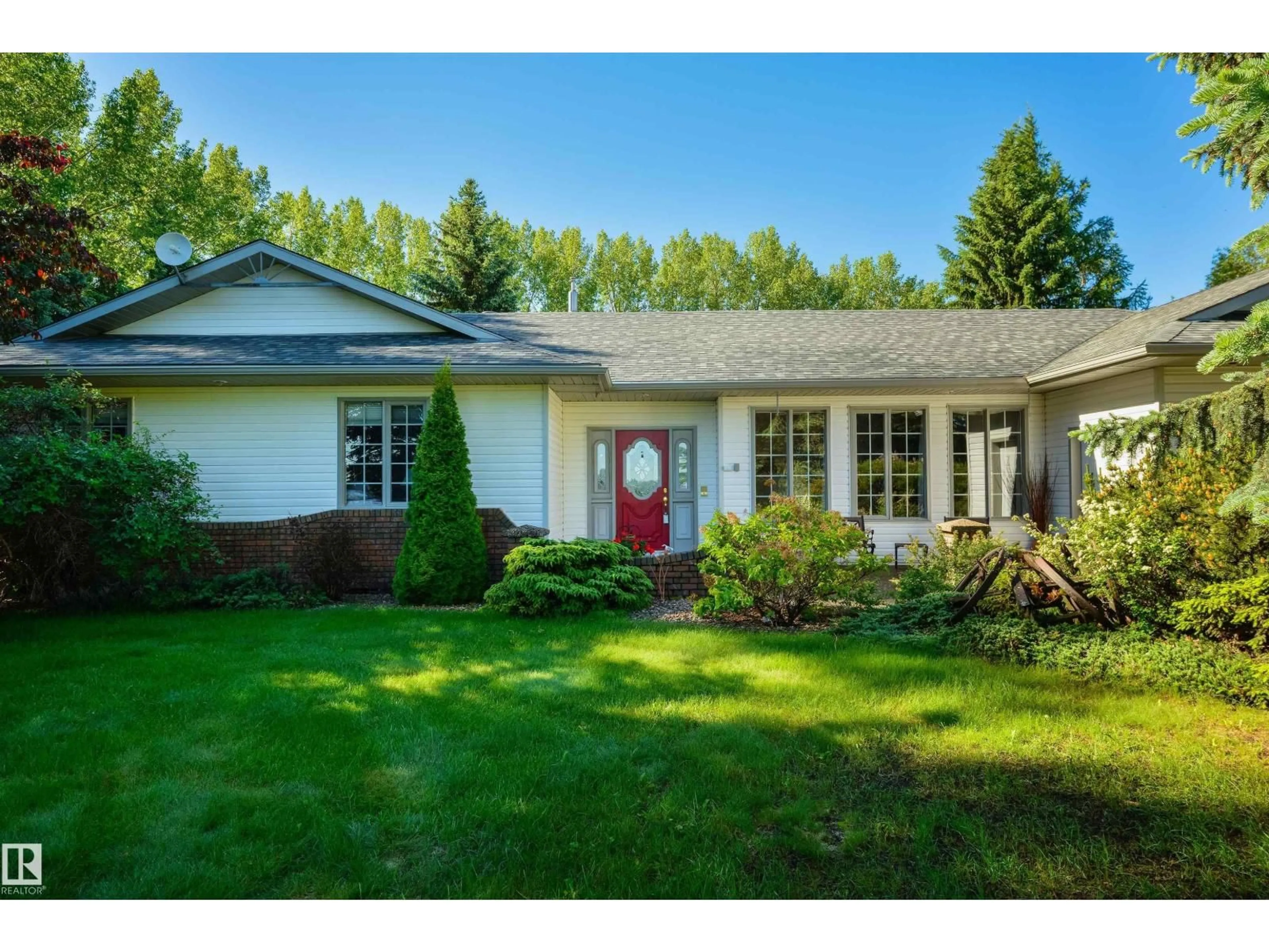 Home with vinyl exterior material, street for 27113 TWP RD 522, Rural Parkland County Alberta T7X3A8