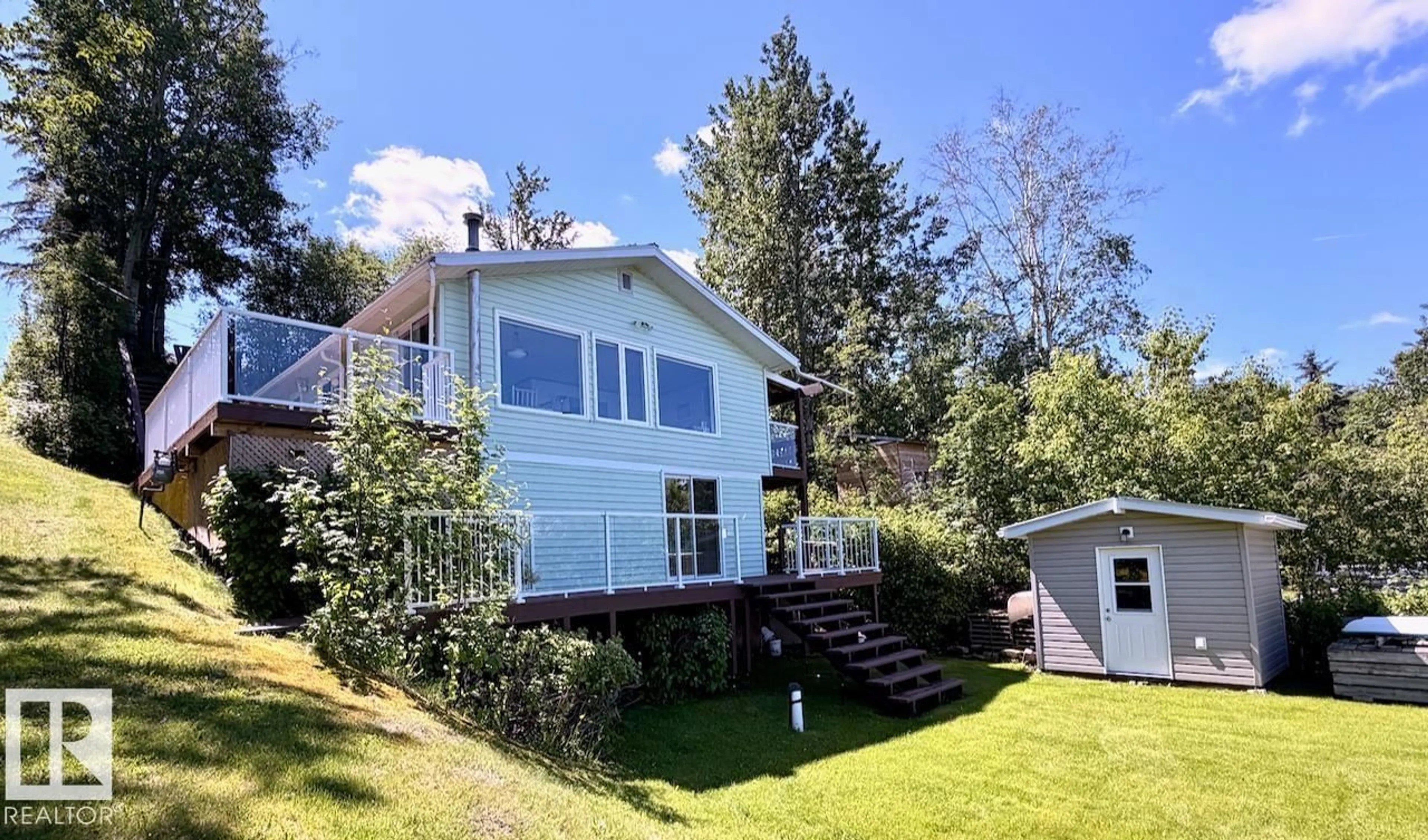 A pic from outside/outdoor area/front of a property/back of a property/a pic from drone, water/lake/river/ocean view for 14 52515 RGE ROAD 52, Rural Parkland County Alberta T0E2B0