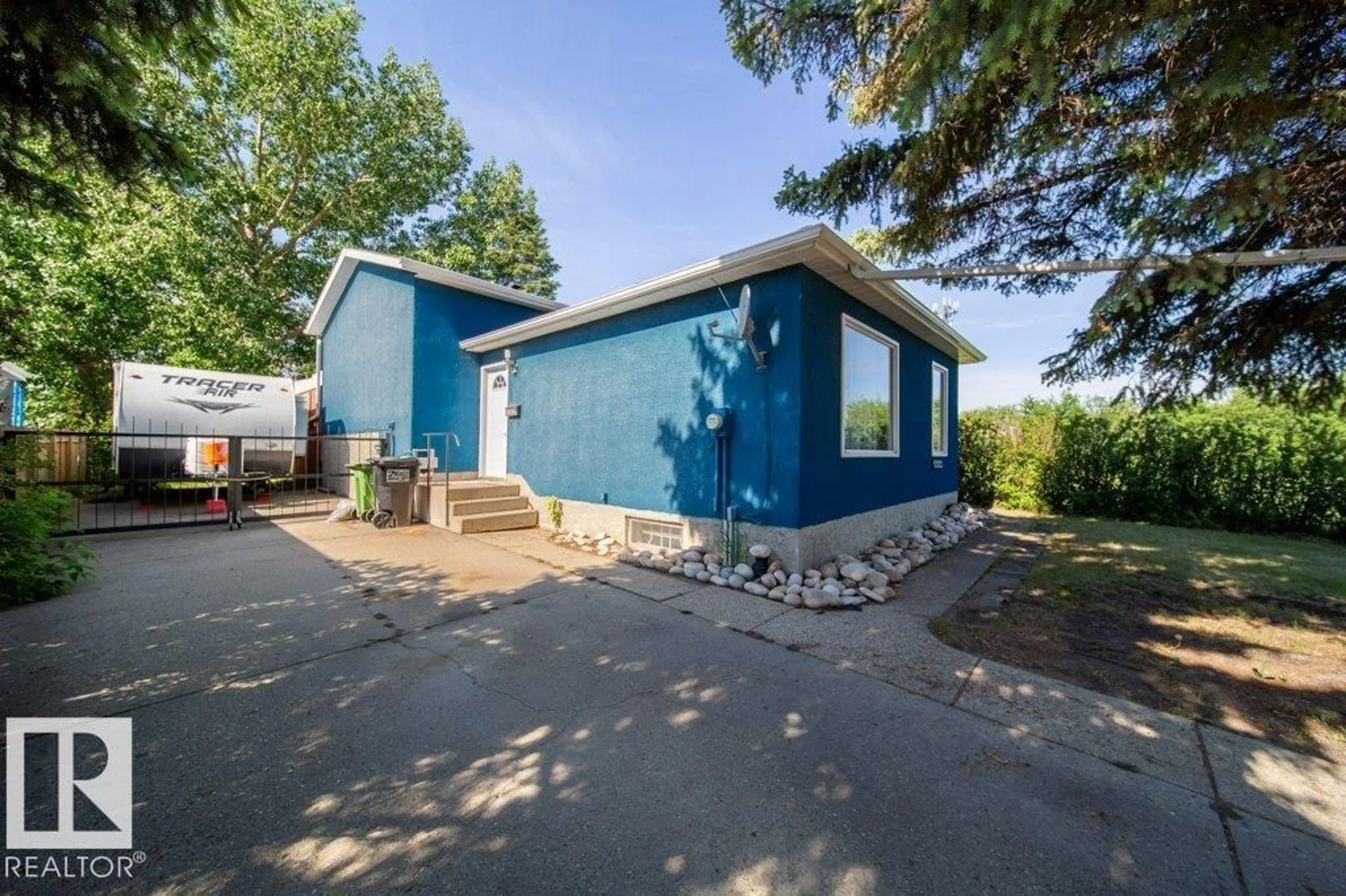 Home with vinyl exterior material, street for 4823 10 AV, Edmonton Alberta T6L4S2