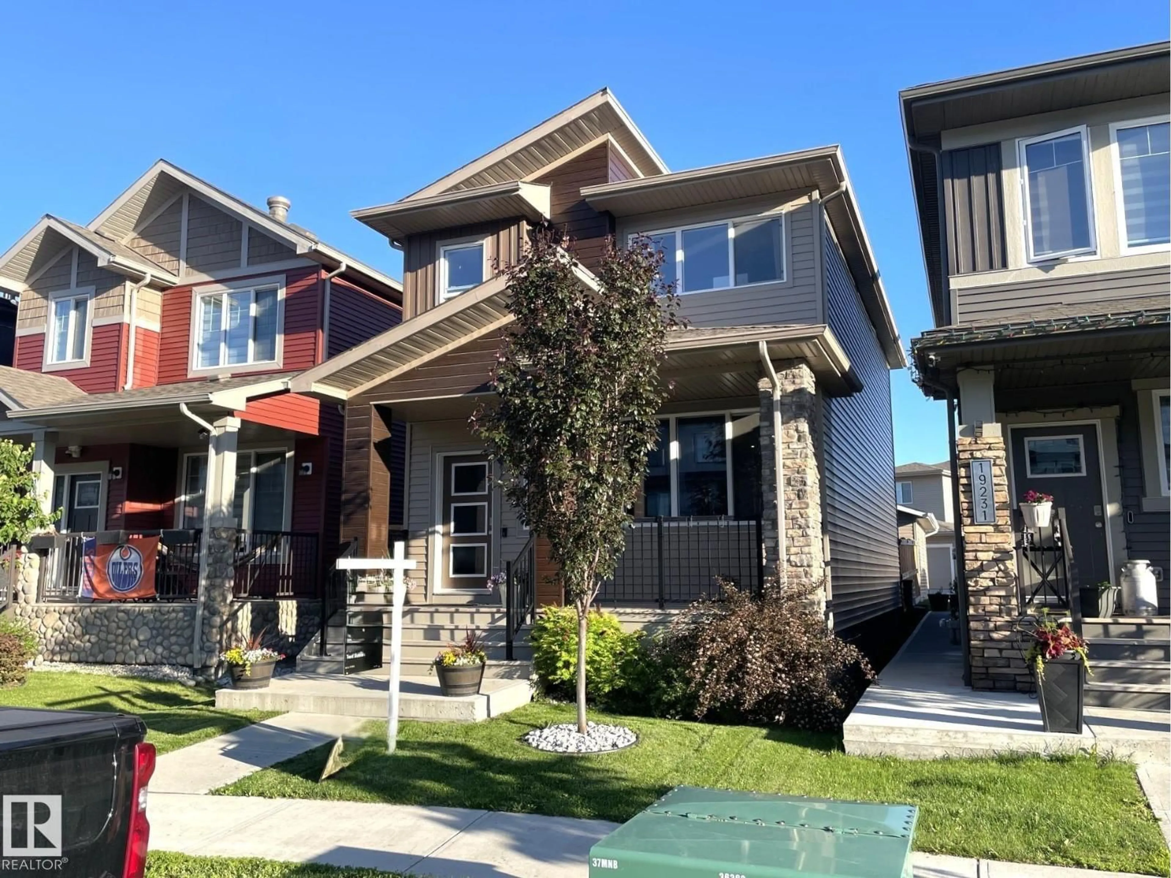 Home with vinyl exterior material, street for 19227 27 AV, Edmonton Alberta T6M1L1