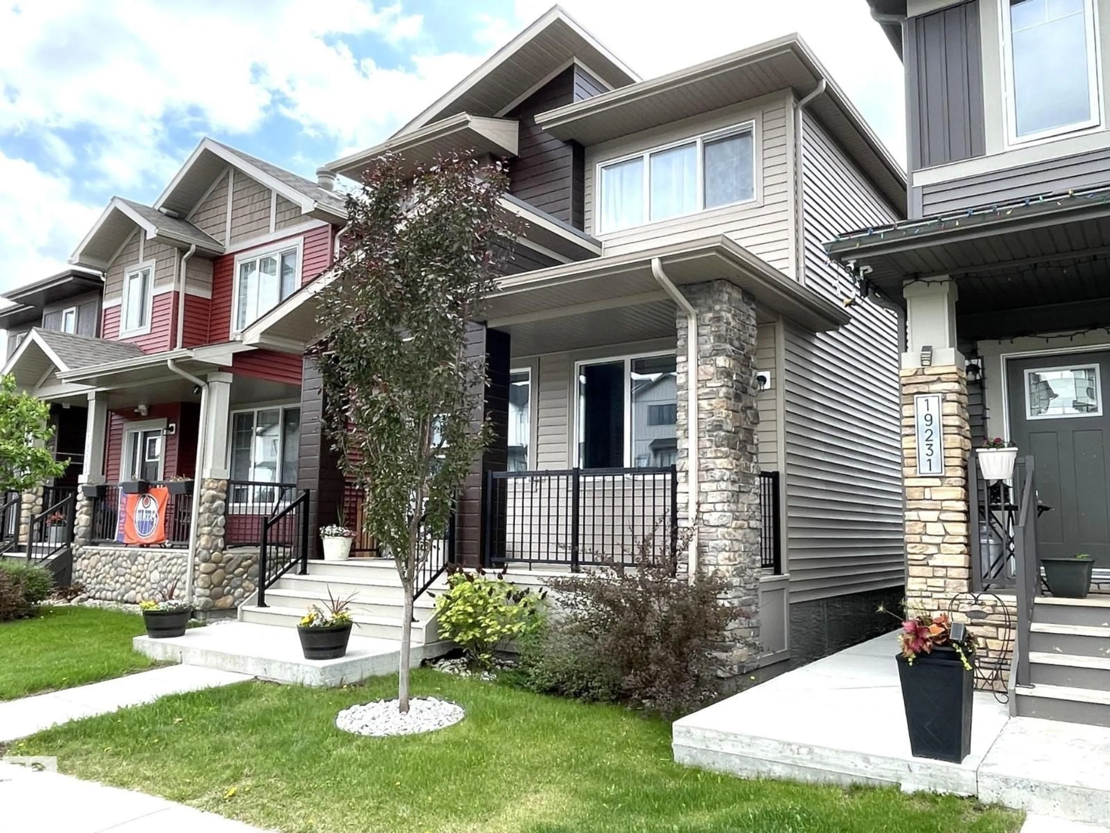 Home with vinyl exterior material, street for 19227 27 AV, Edmonton Alberta T6M1L1