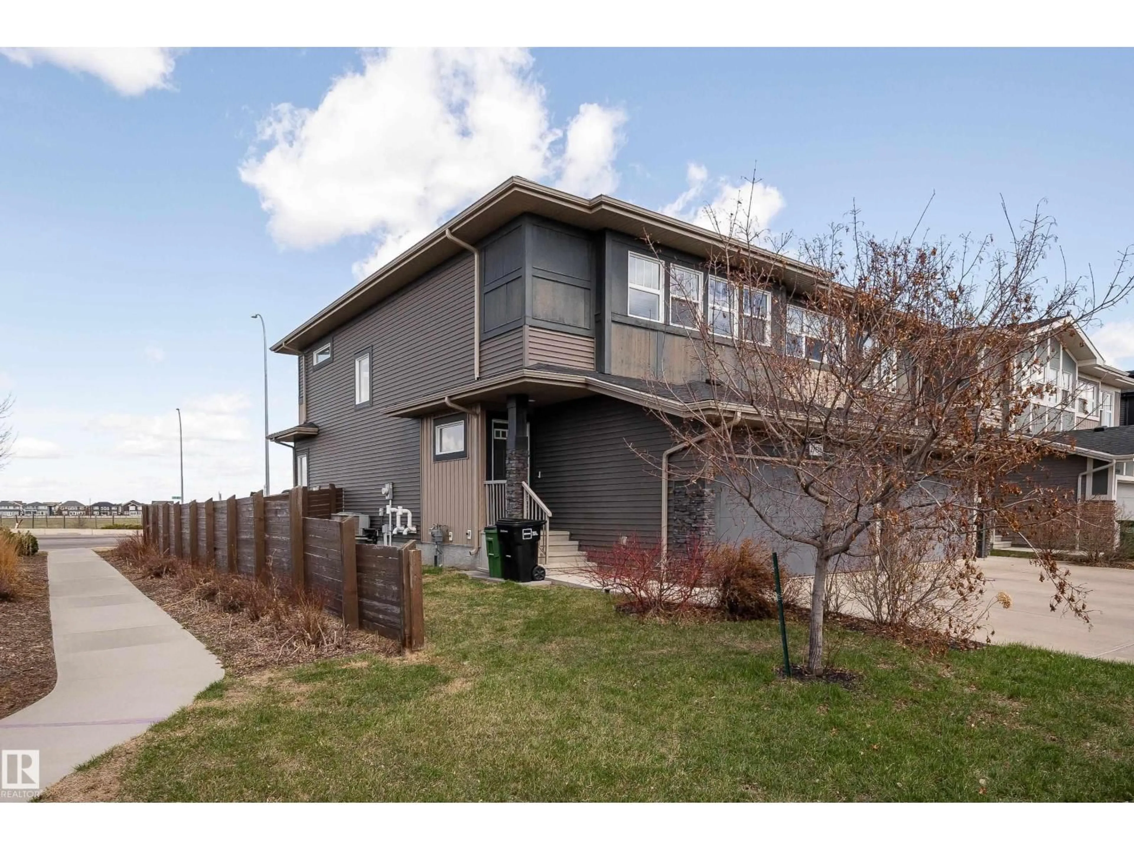 Home with vinyl exterior material, street for 2704 KOSHAL PL, Edmonton Alberta T6W3J7