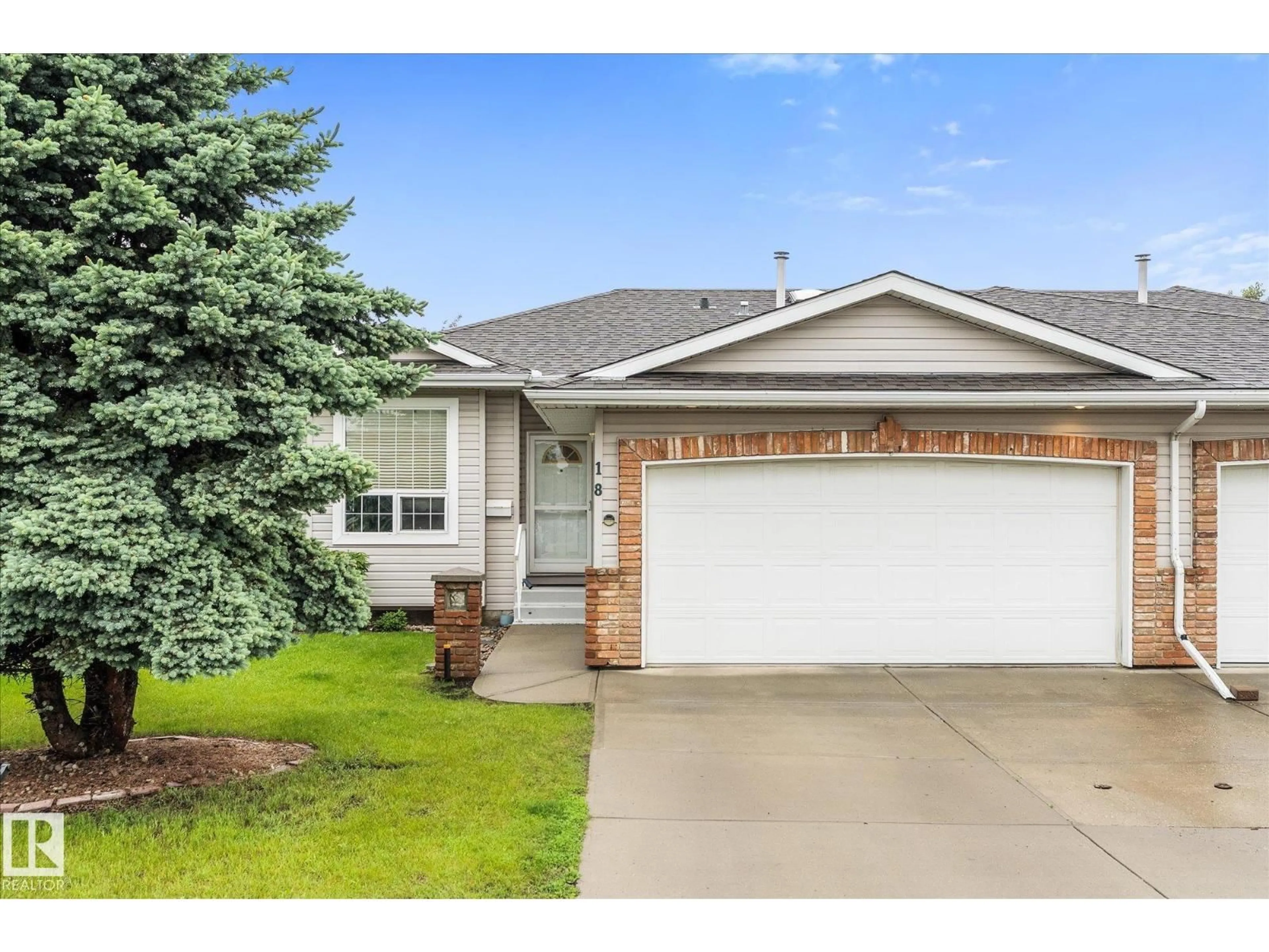 Home with vinyl exterior material, street for 18 HILLCREST CO, Spruce Grove Alberta T7X4A8