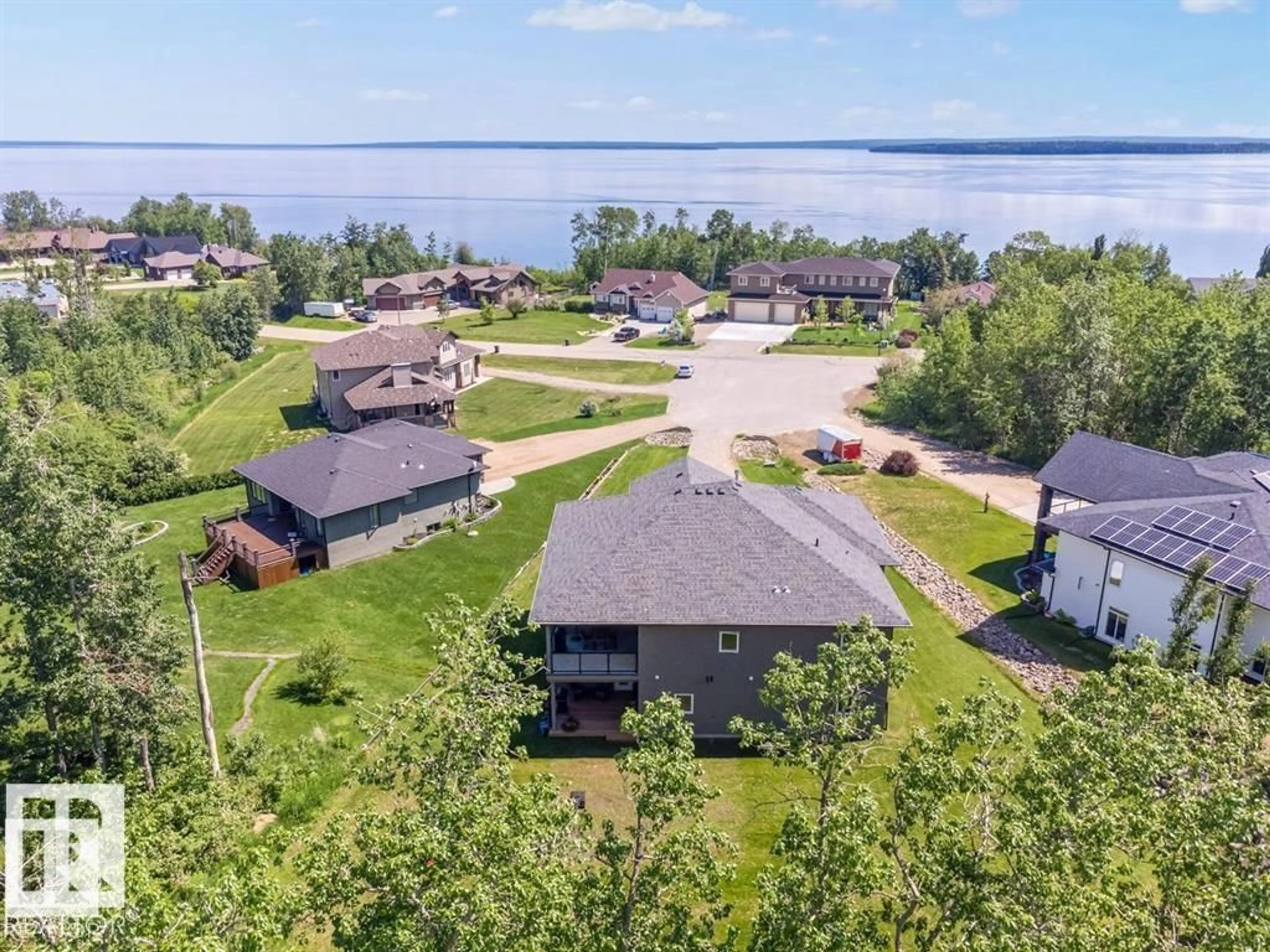 A pic from outside/outdoor area/front of a property/back of a property/a pic from drone, water/lake/river/ocean view for 1609 HORSESHOE BAY, Cold Lake Alberta T9M1G9