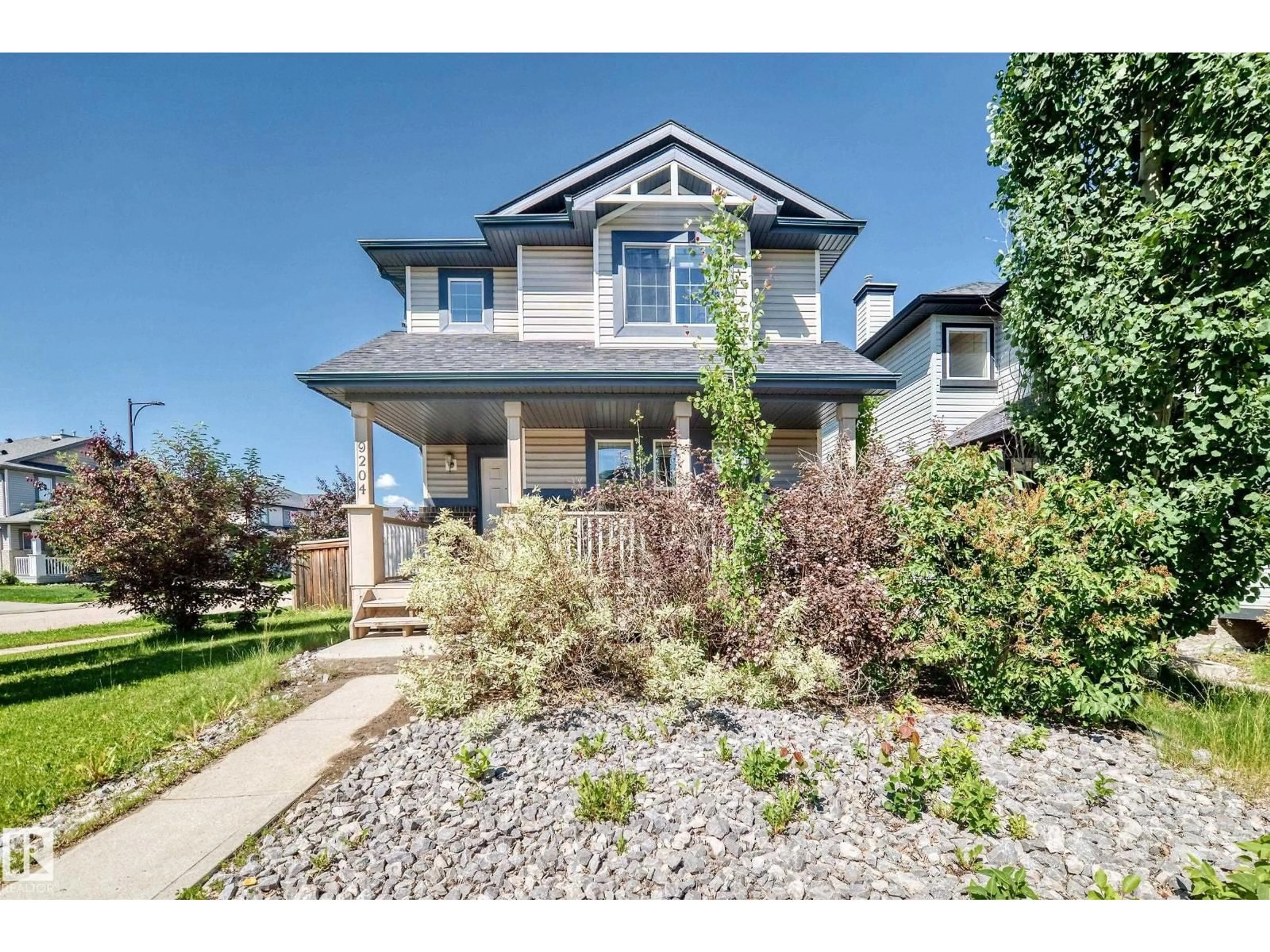Home with brick exterior material, street for 9204 SCOTT LN, Edmonton Alberta T6R0E7