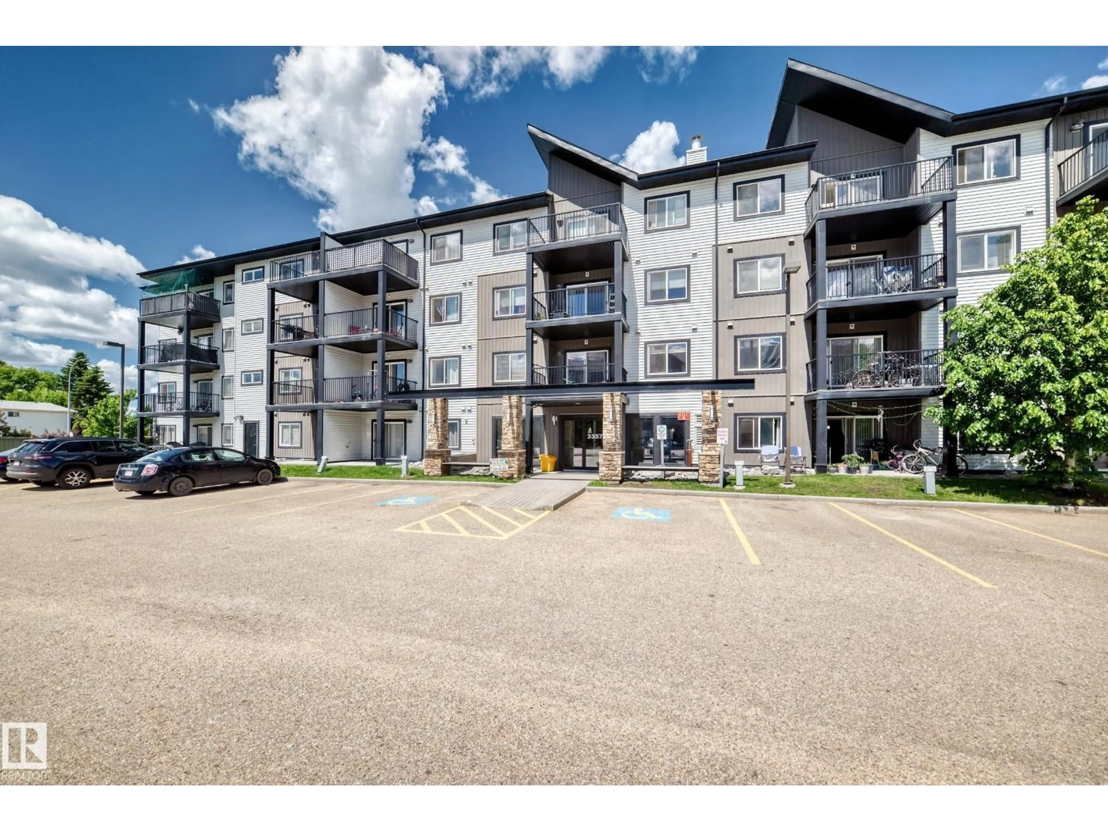 A pic from outside/outdoor area/front of a property/back of a property/a pic from drone, building for #416 - 3357 16A AV, Edmonton Alberta T6T0V4