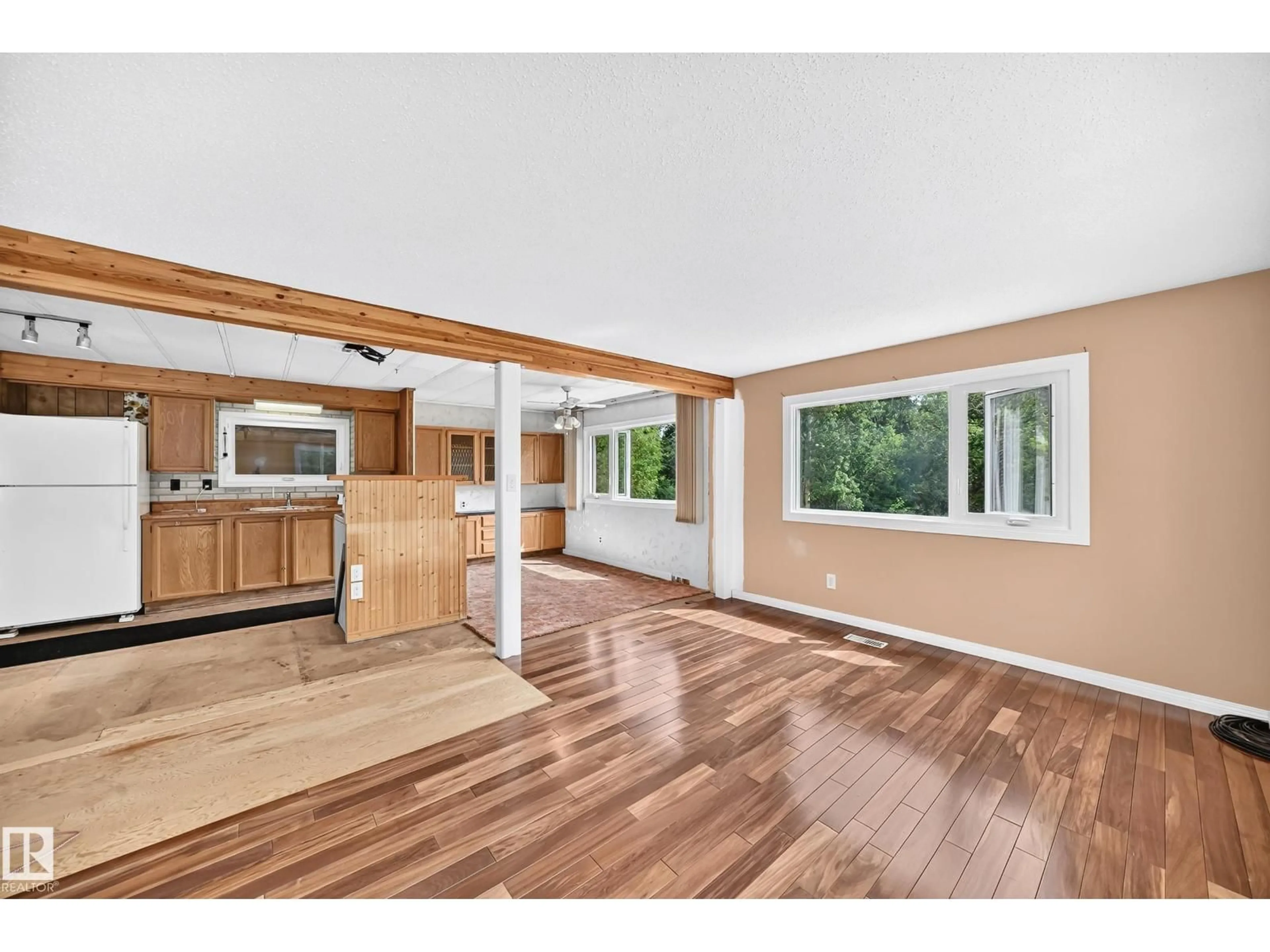 Open concept kitchen, wood/laminate floor for 205 - 53110 RGE ROAD 213 NE, Rural Strathcona County Alberta T8G2C3