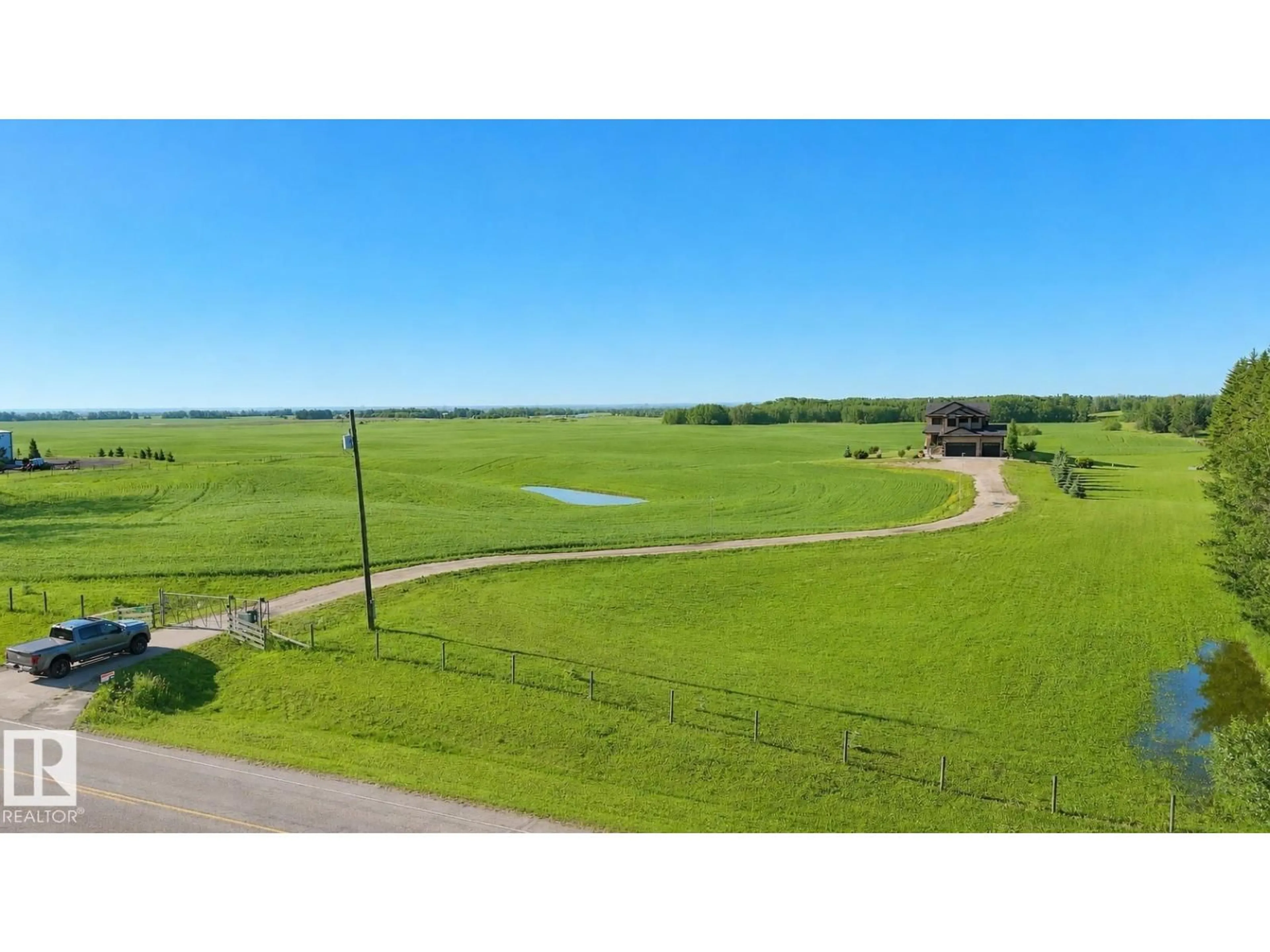 A pic from outside/outdoor area/front of a property/back of a property/a pic from drone, water/lake/river/ocean view for 512 - 1423 TWP ROAD, Rural Parkland County Alberta T7Y2N8