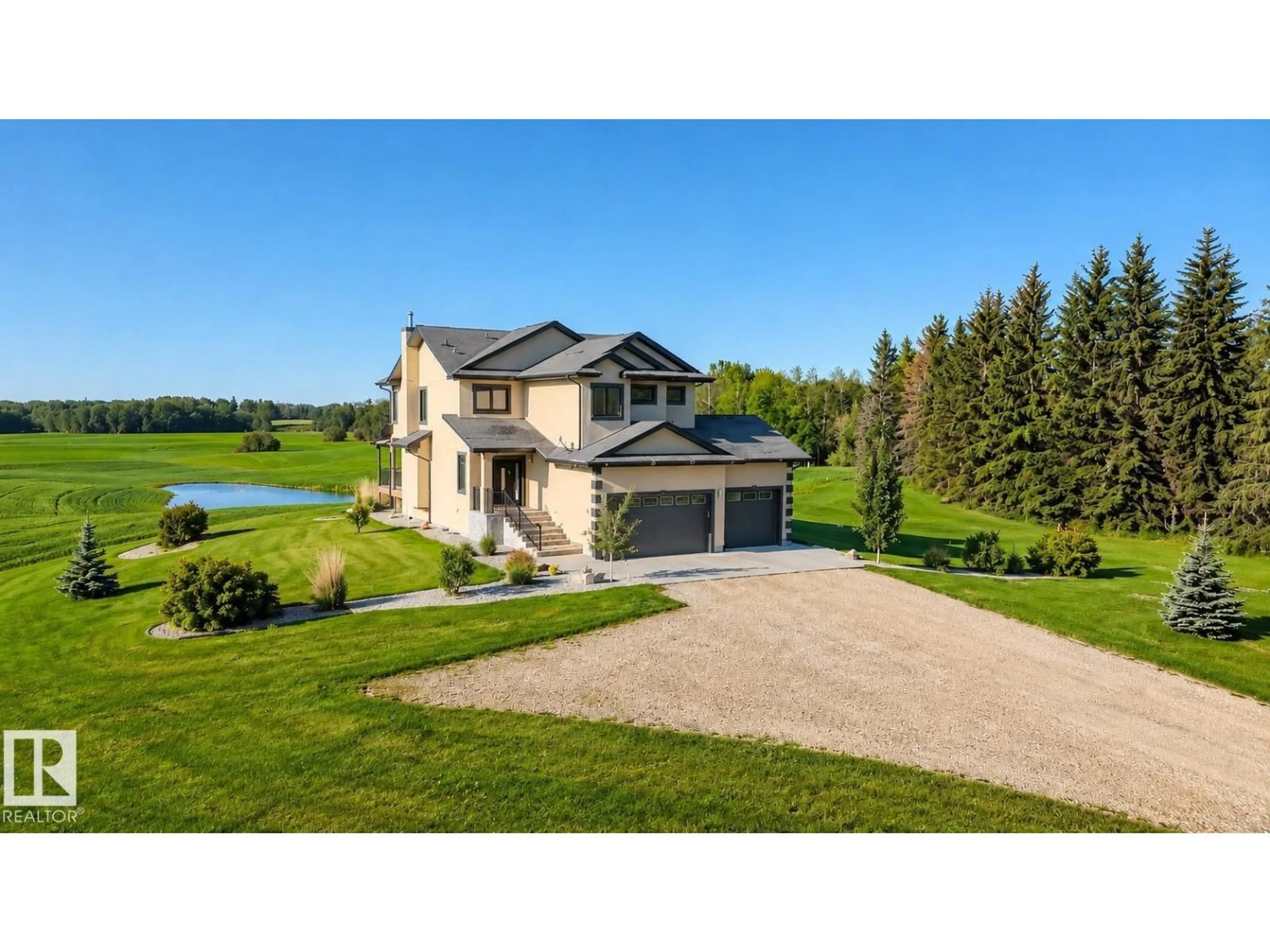 A pic from outside/outdoor area/front of a property/back of a property/a pic from drone, water/lake/river/ocean view for 512 - 1423 TWP ROAD, Rural Parkland County Alberta T7Y2N8
