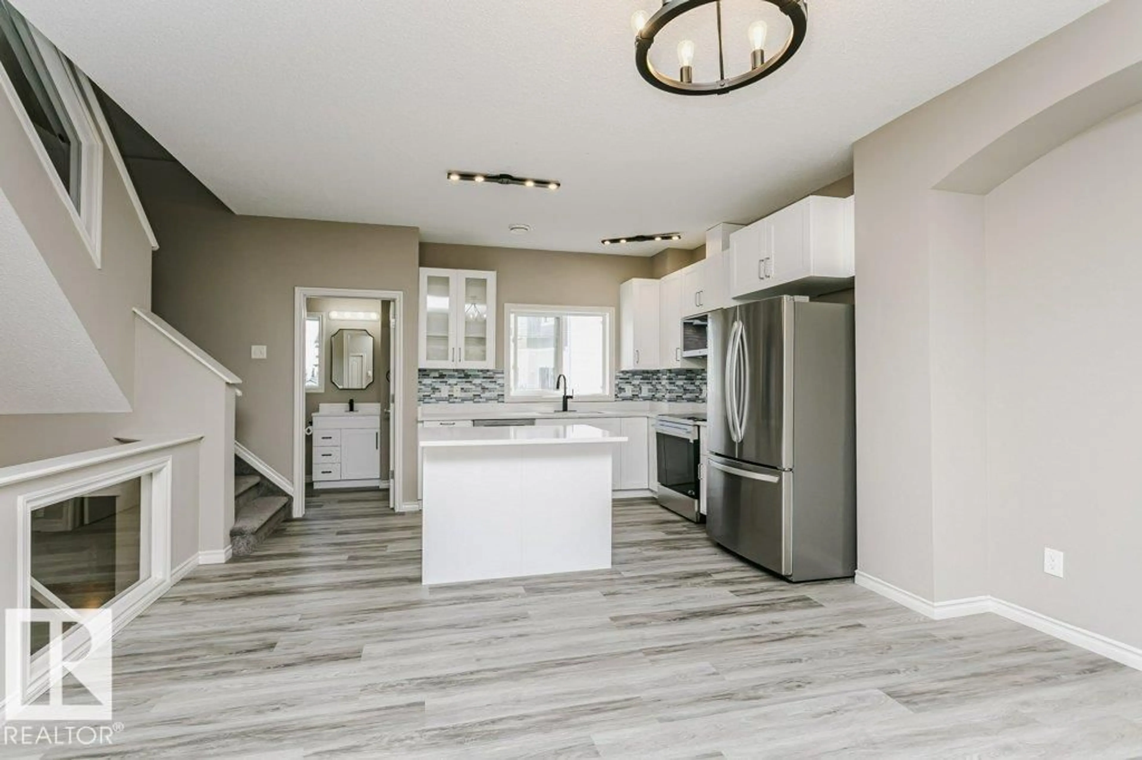 Open concept kitchen, ceramic/tile floor for #101 - 3010 33 AV, Edmonton Alberta T6T0C3