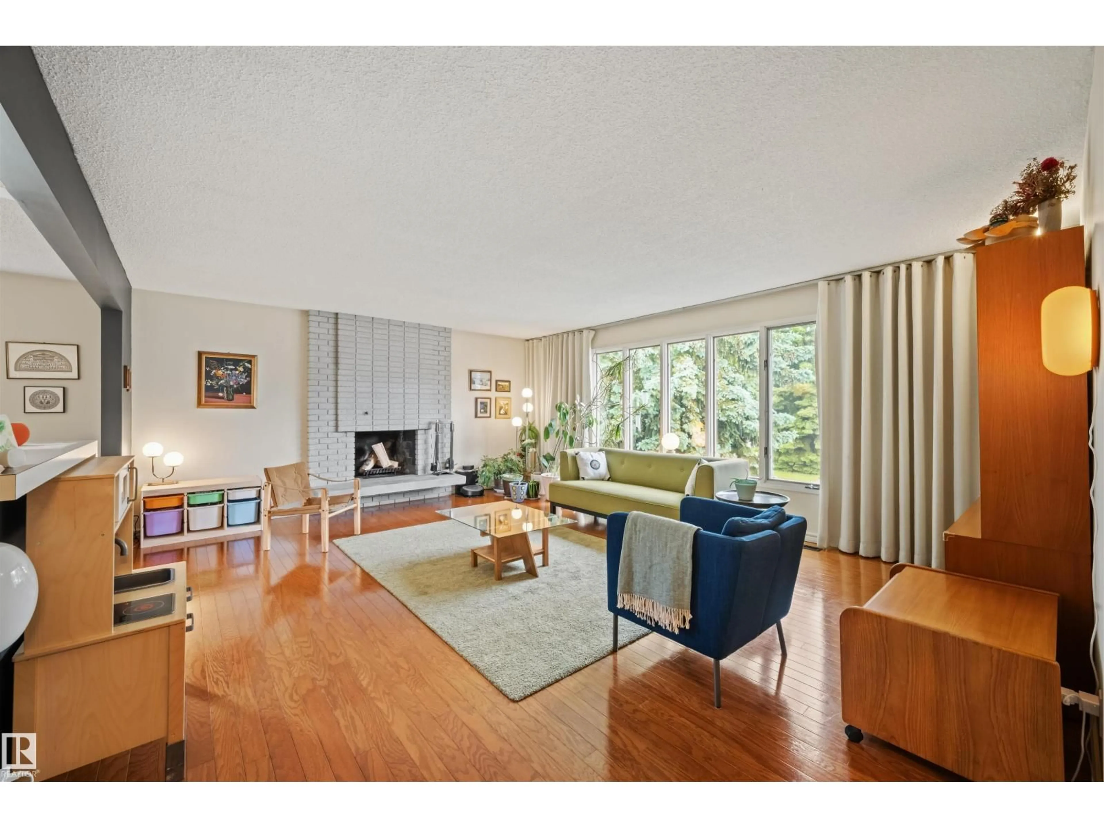 Living room with furniture, unknown for 11329 33A AV, Edmonton Alberta T6J4G1