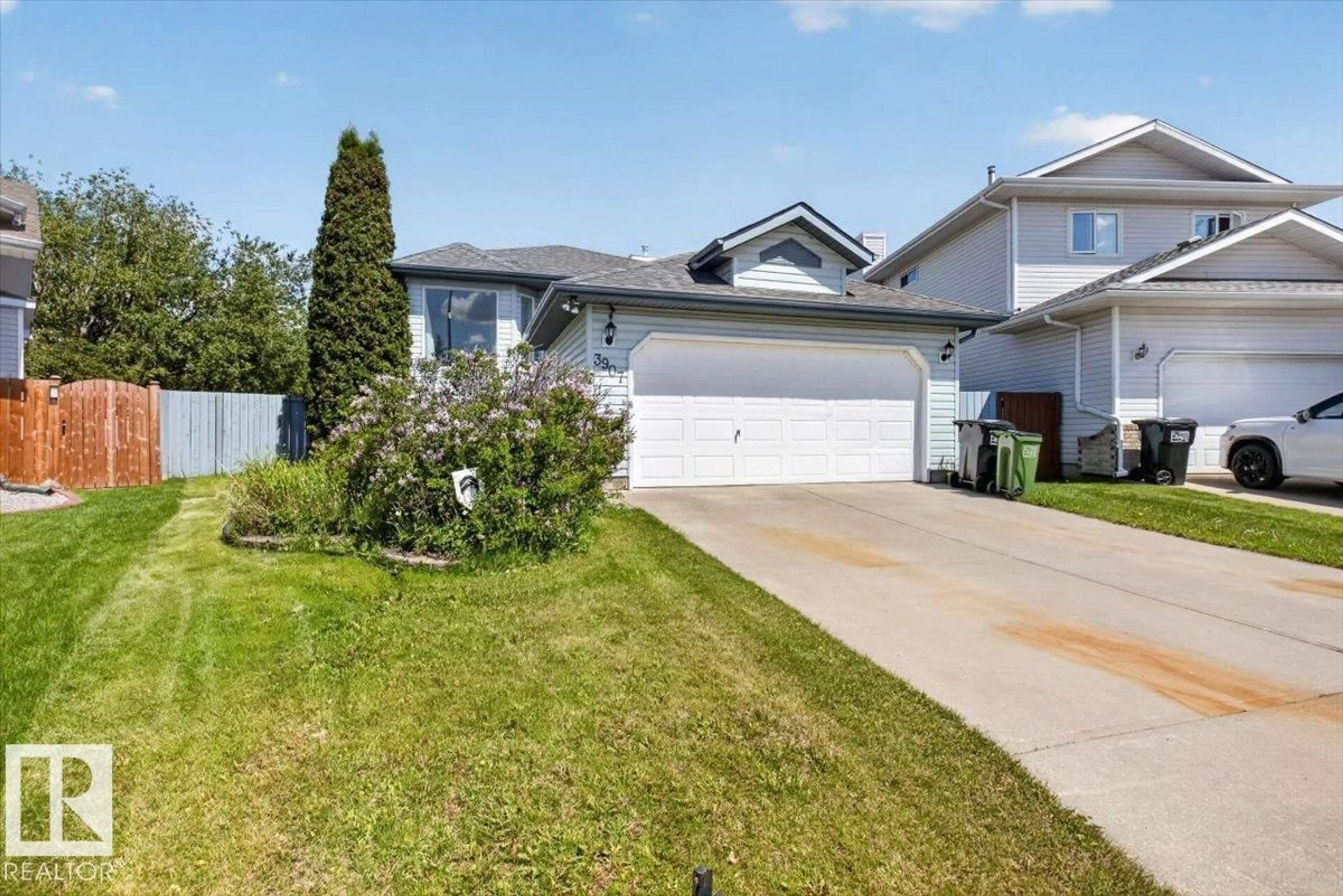 Home with vinyl exterior material, street for 3907 33 ST, Edmonton Alberta T6T1J7