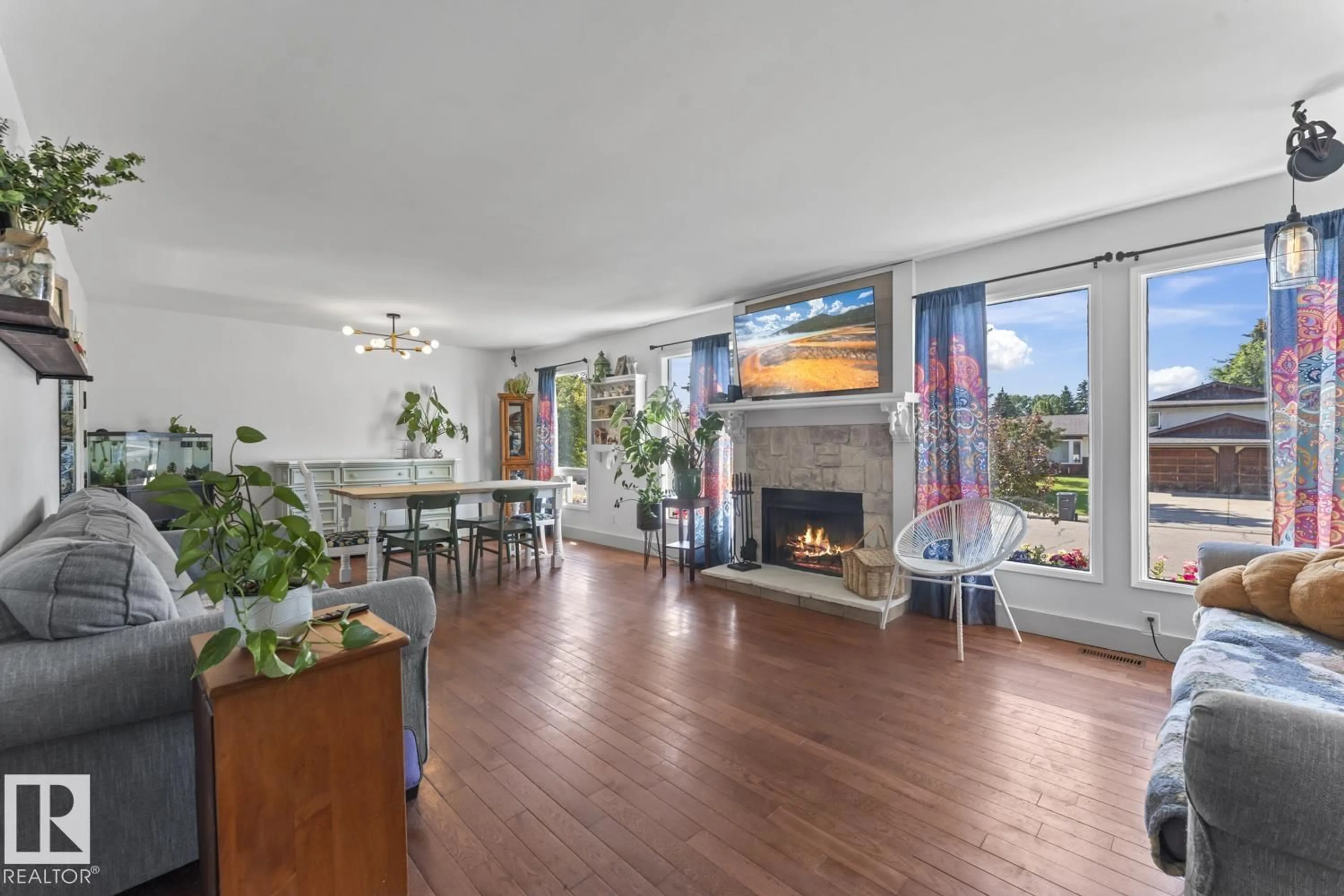 Living room with furniture, wood/laminate floor for 2006 3 AV, Cold Lake Alberta T9M1E1