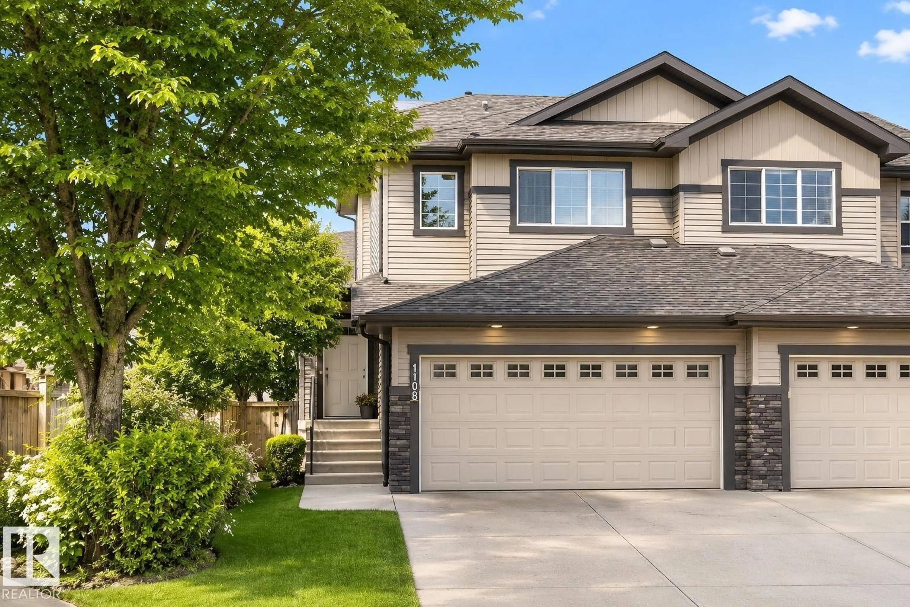 Home with vinyl exterior material, street for SW - 1103 176 ST, Edmonton Alberta T6W2B7