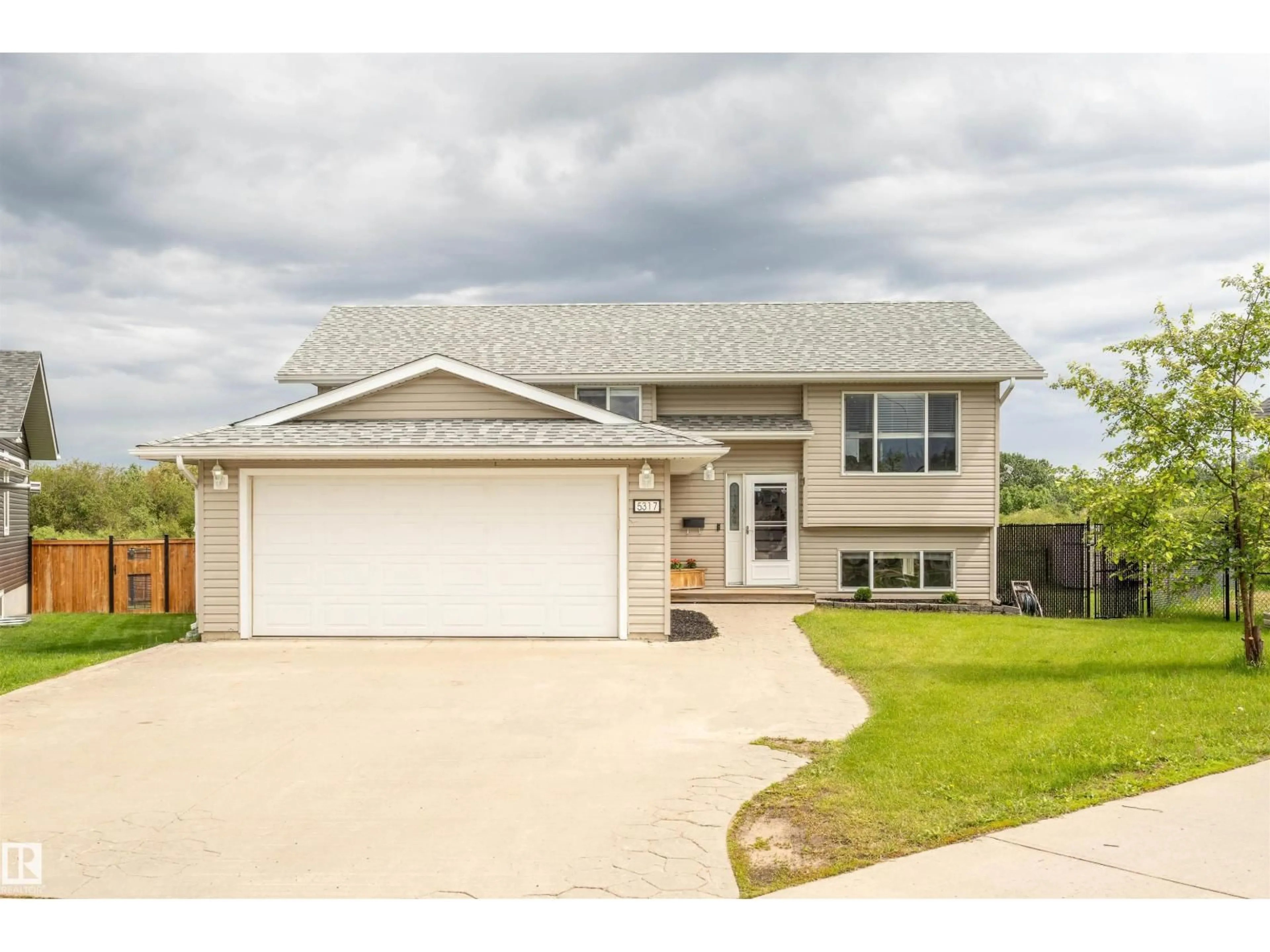 Home with vinyl exterior material, street for 5317 60 ST, Cold Lake Alberta T9M1N8