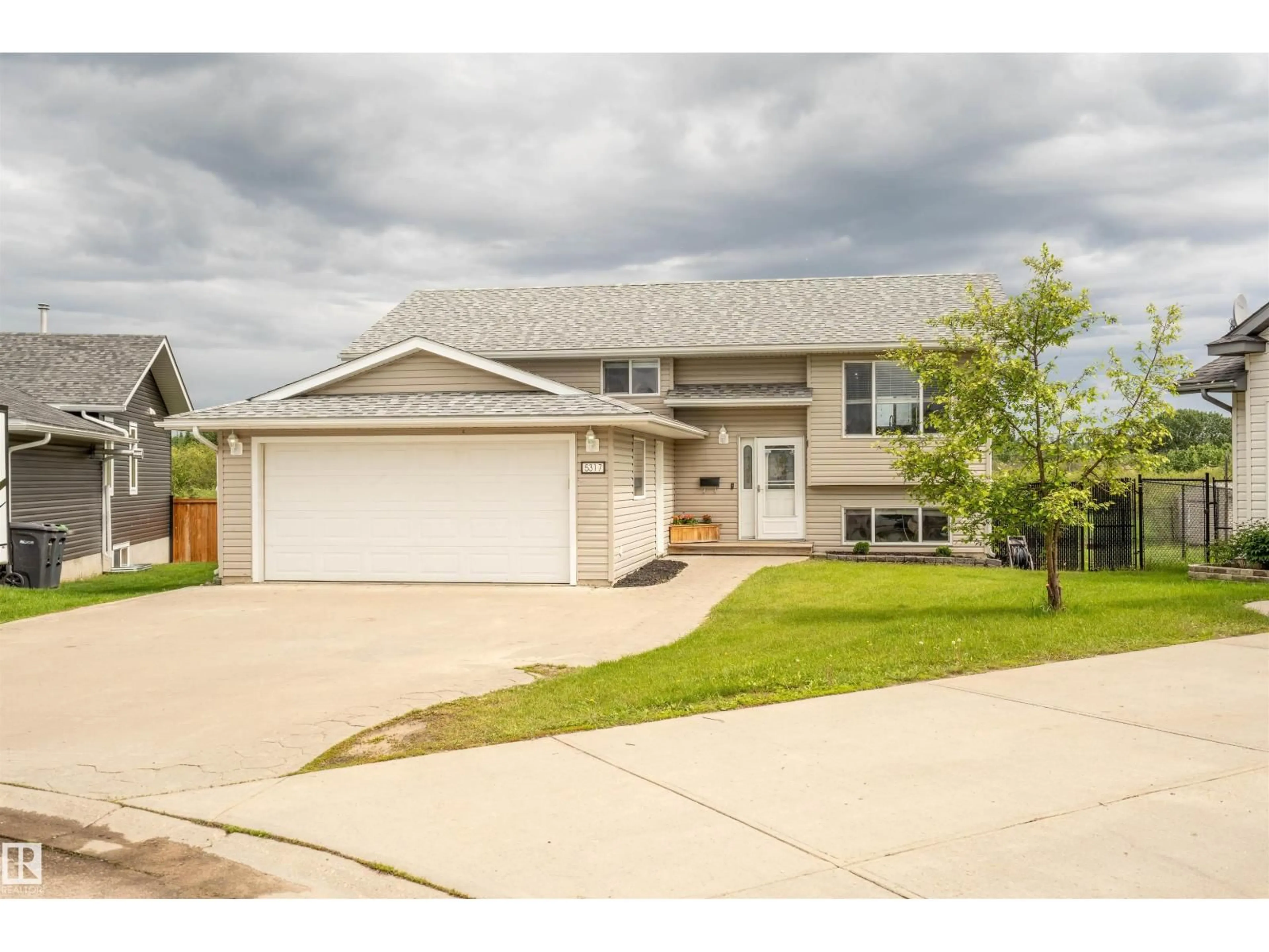 Home with vinyl exterior material, street for 5317 60 ST, Cold Lake Alberta T9M1N8