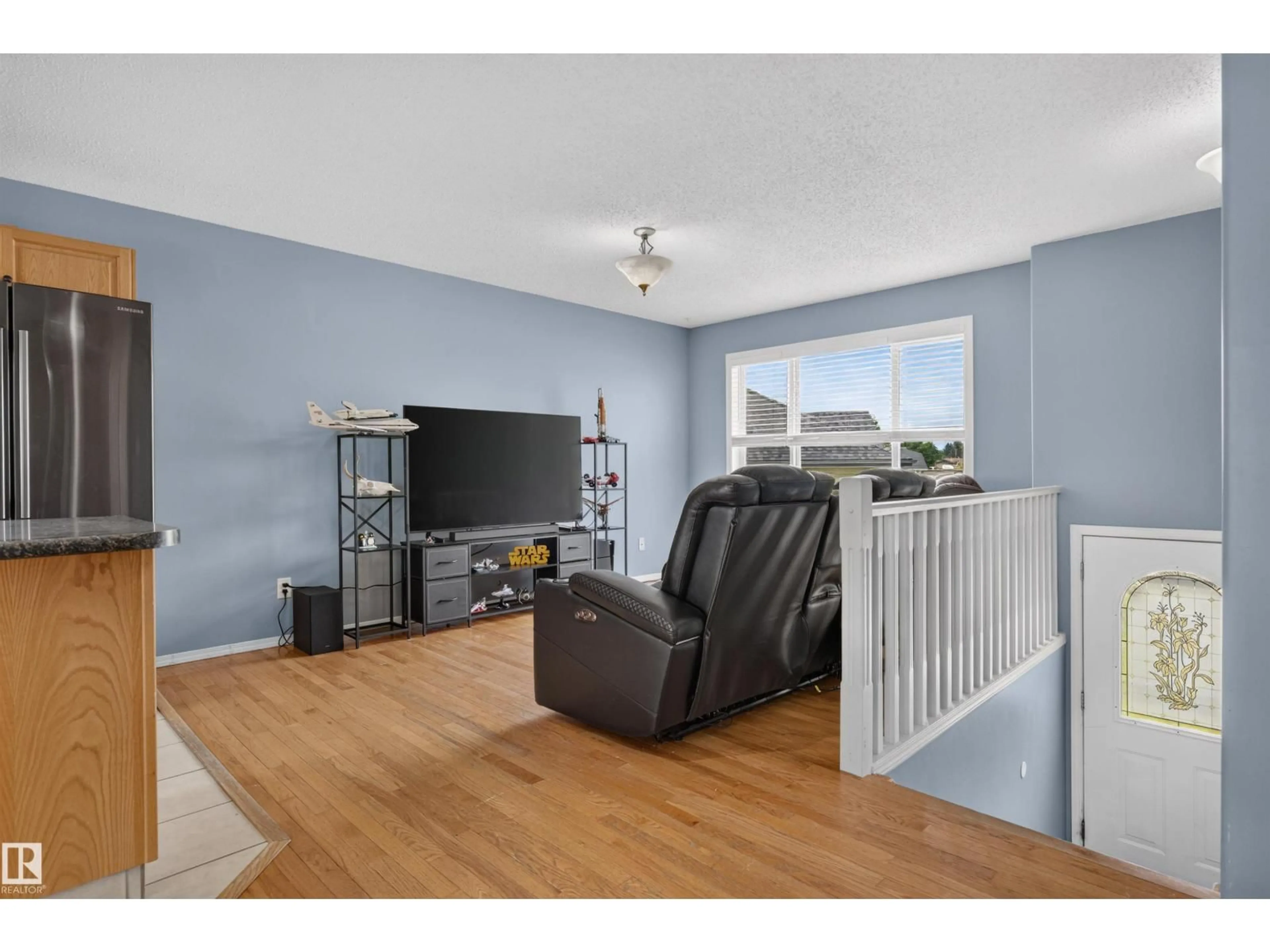 Living room with furniture, wood/laminate floor for 5317 60 ST, Cold Lake Alberta T9M1N8