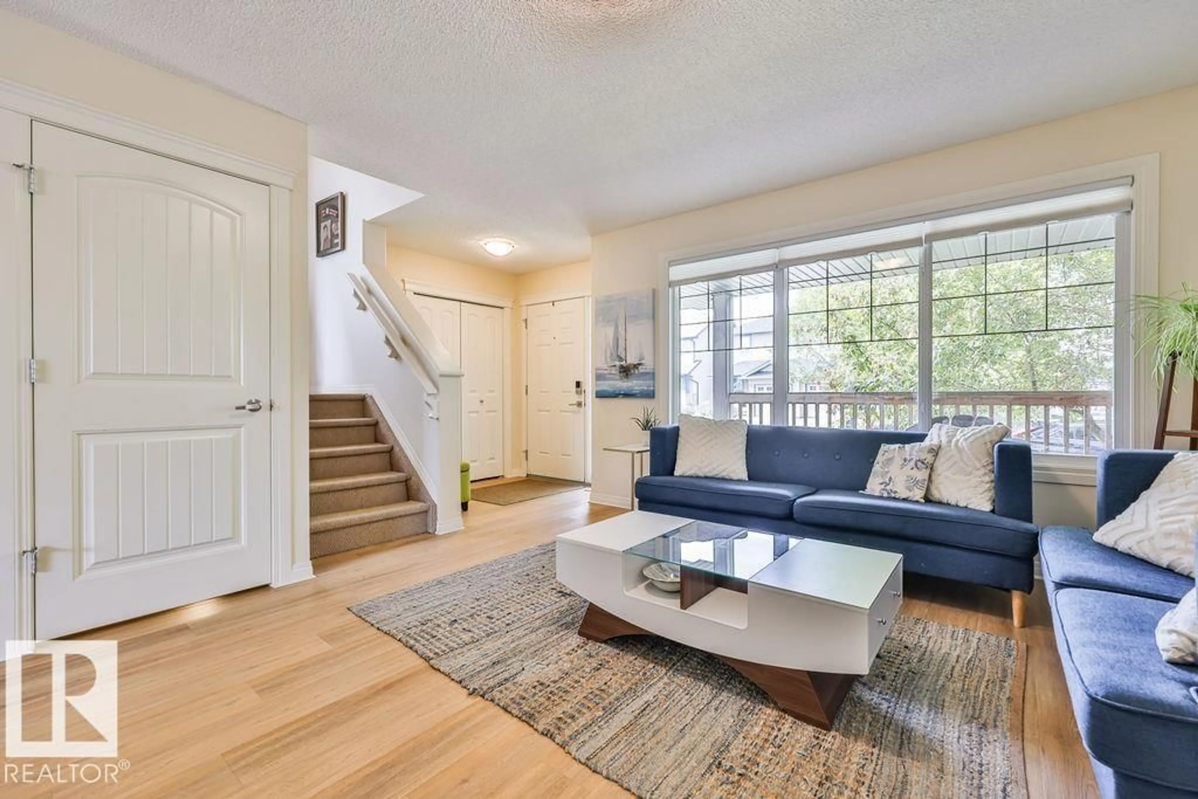 Living room with furniture, unknown for 8760 STEIN LN, Edmonton Alberta T6R0L5