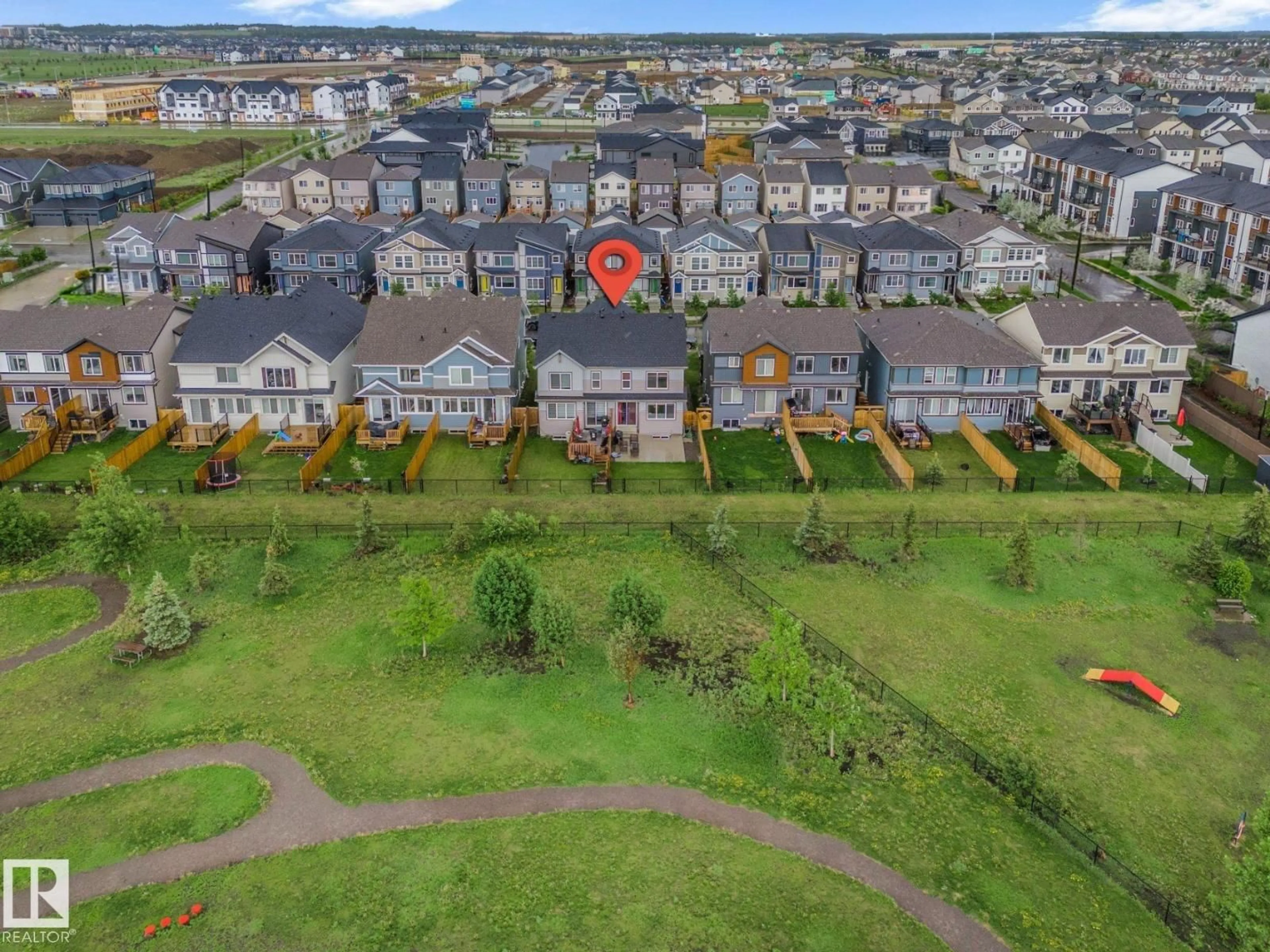 A pic from outside/outdoor area/front of a property/back of a property/a pic from drone, city buildings view from balcony for 1222 PODERSKY WD, Edmonton Alberta T6W4W3