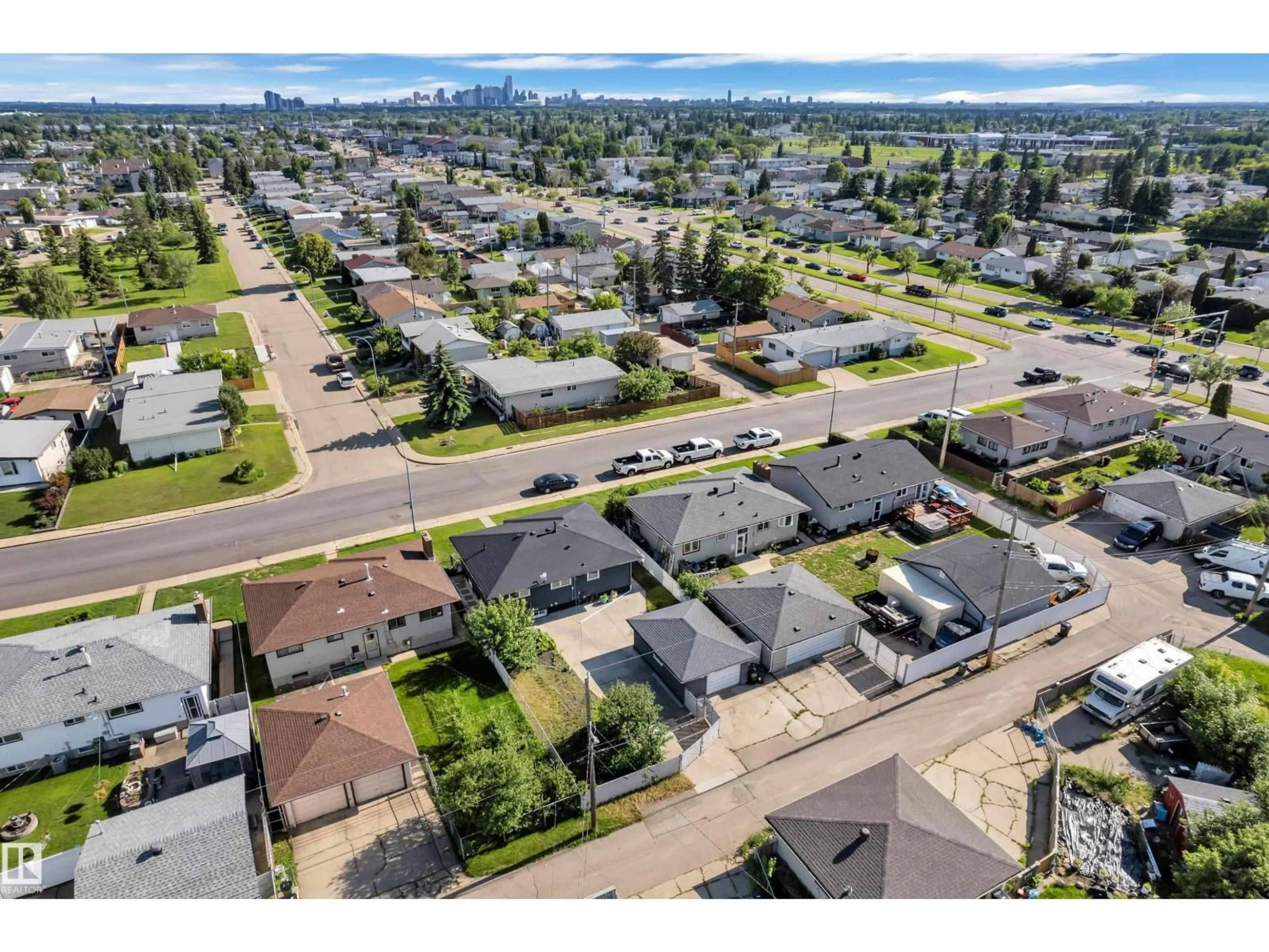 A pic from outside/outdoor area/front of a property/back of a property/a pic from drone, street for 8104 135 AV, Edmonton Alberta T5C2H4