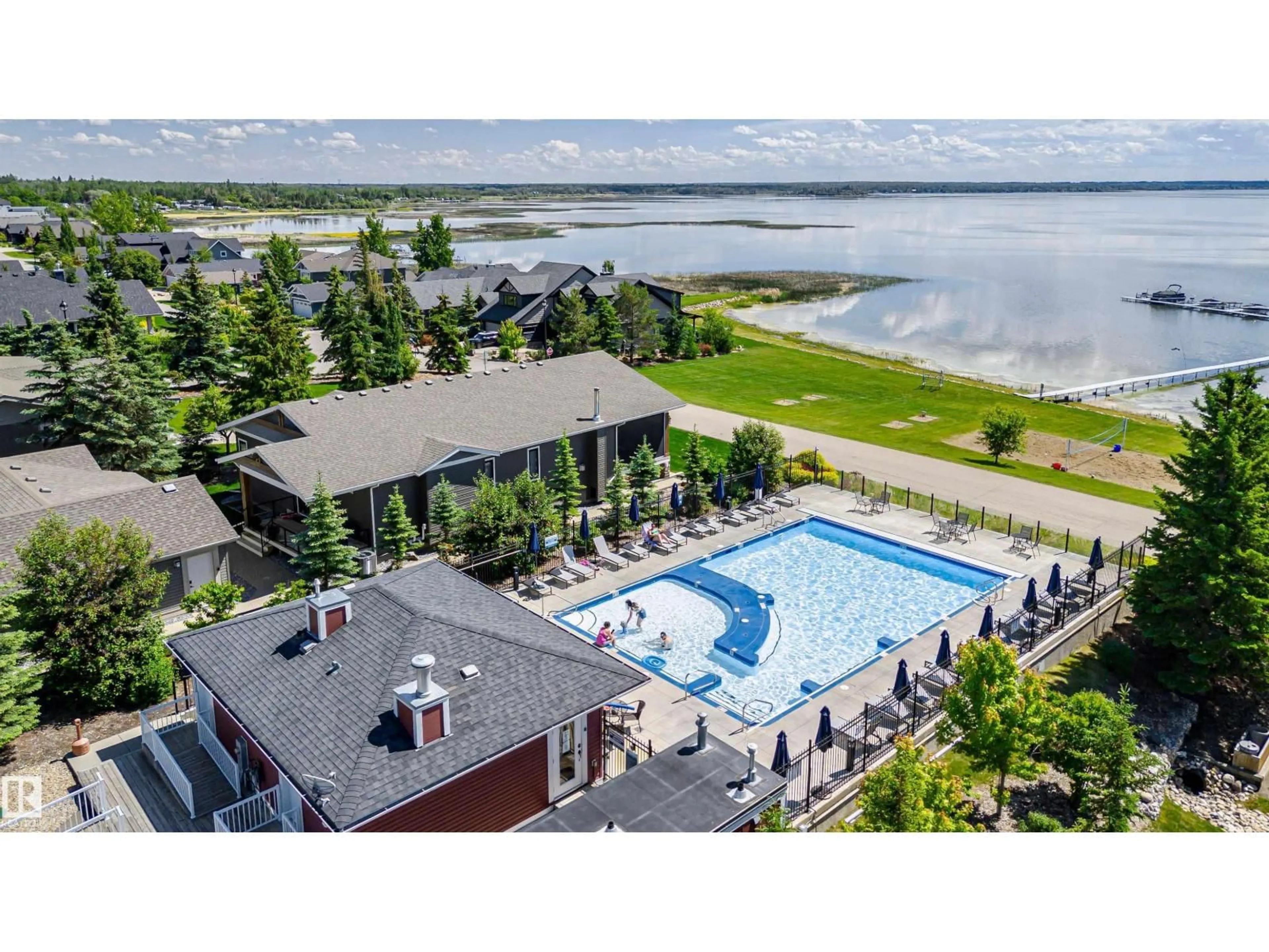 A pic from outside/outdoor area/front of a property/back of a property/a pic from drone, water/lake/river/ocean view for 504 STE. ANNE TR, Rural Lac Ste. Anne County Alberta T0E1A1