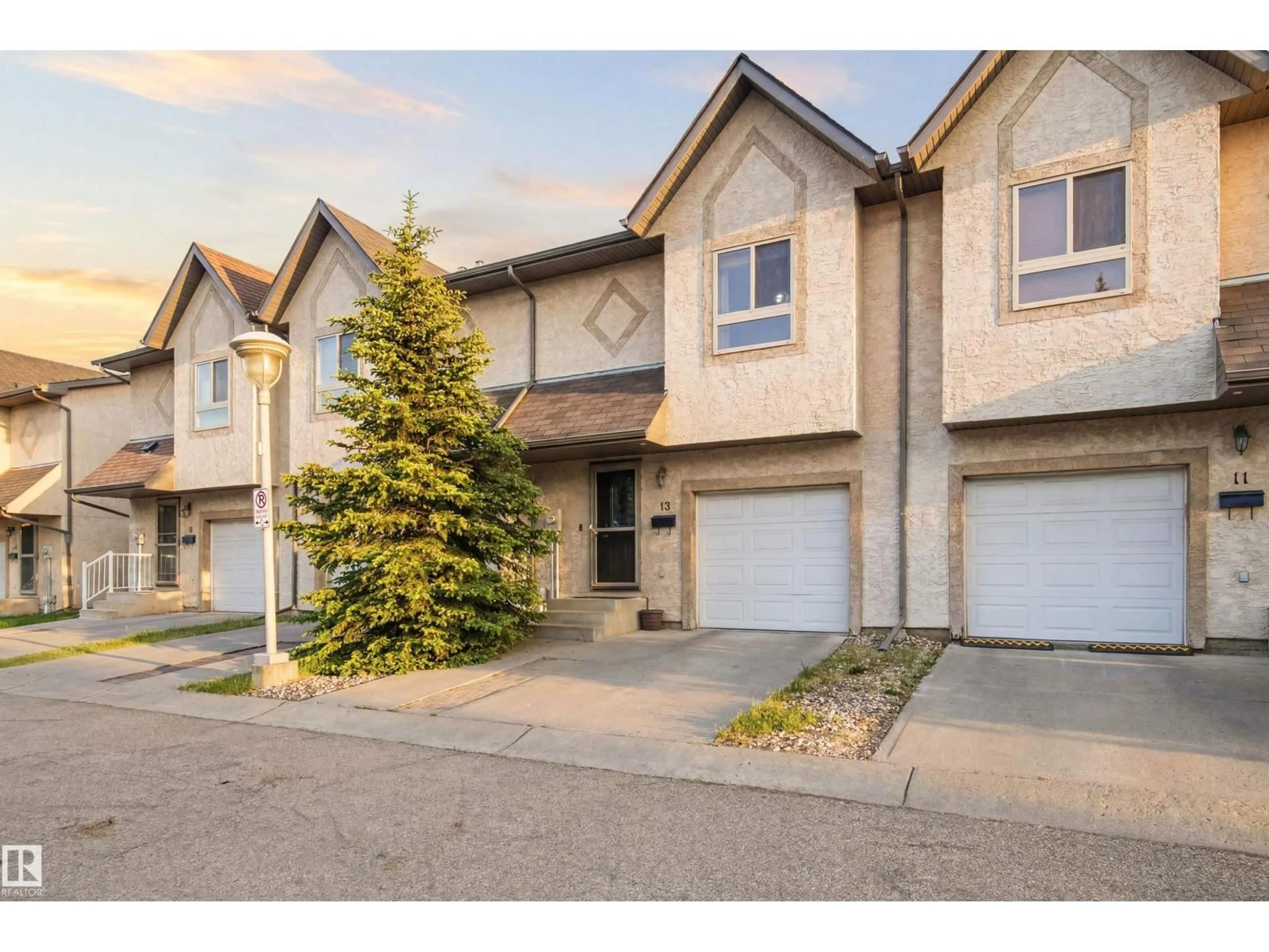 A pic from outside/outdoor area/front of a property/back of a property/a pic from drone, street for 12 16317 64 ST NW, Edmonton Alberta T5Y0A7