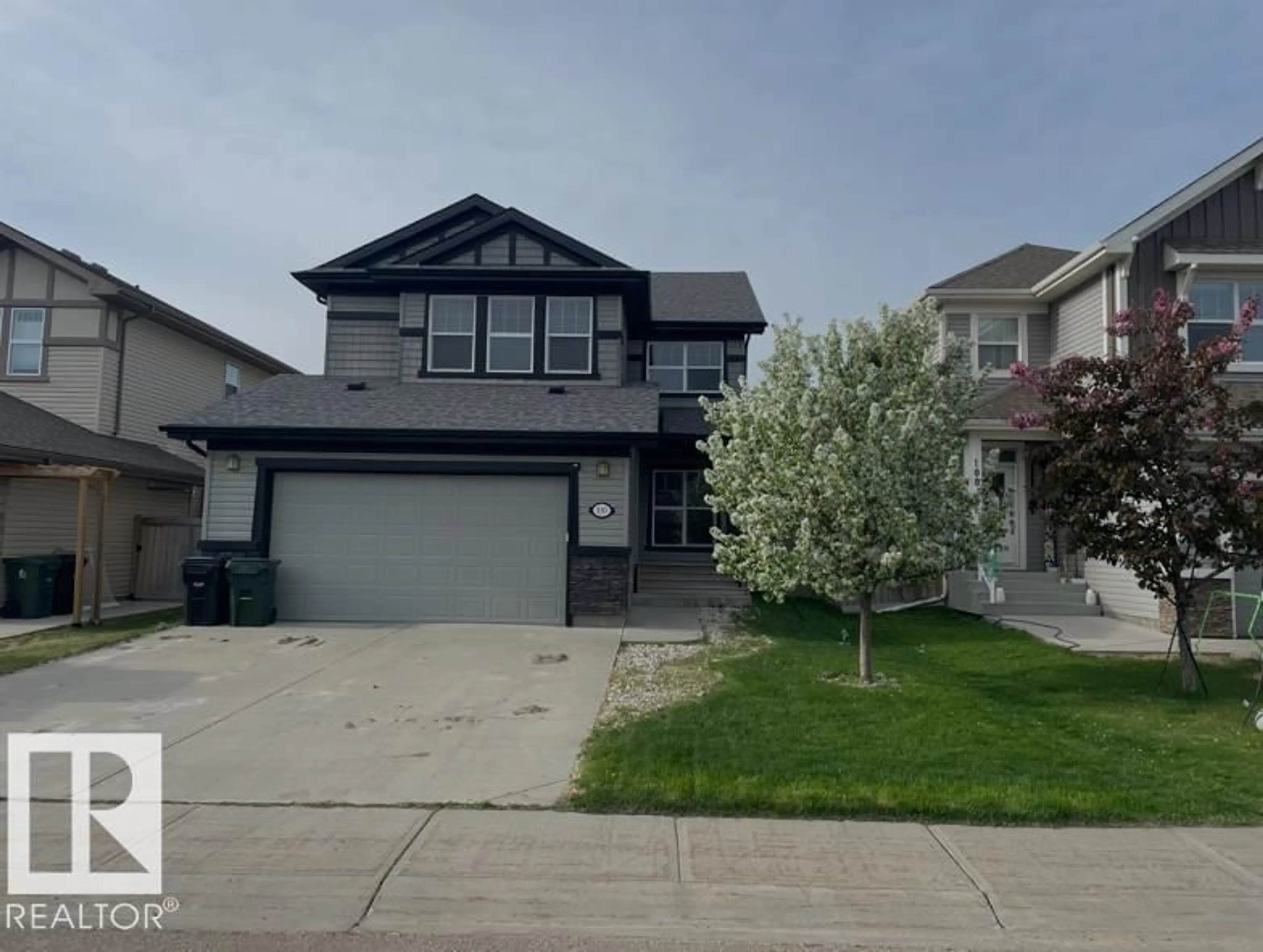Home with vinyl exterior material, street for 110 MEADOWLAND WY, Spruce Grove Alberta T7X0S4