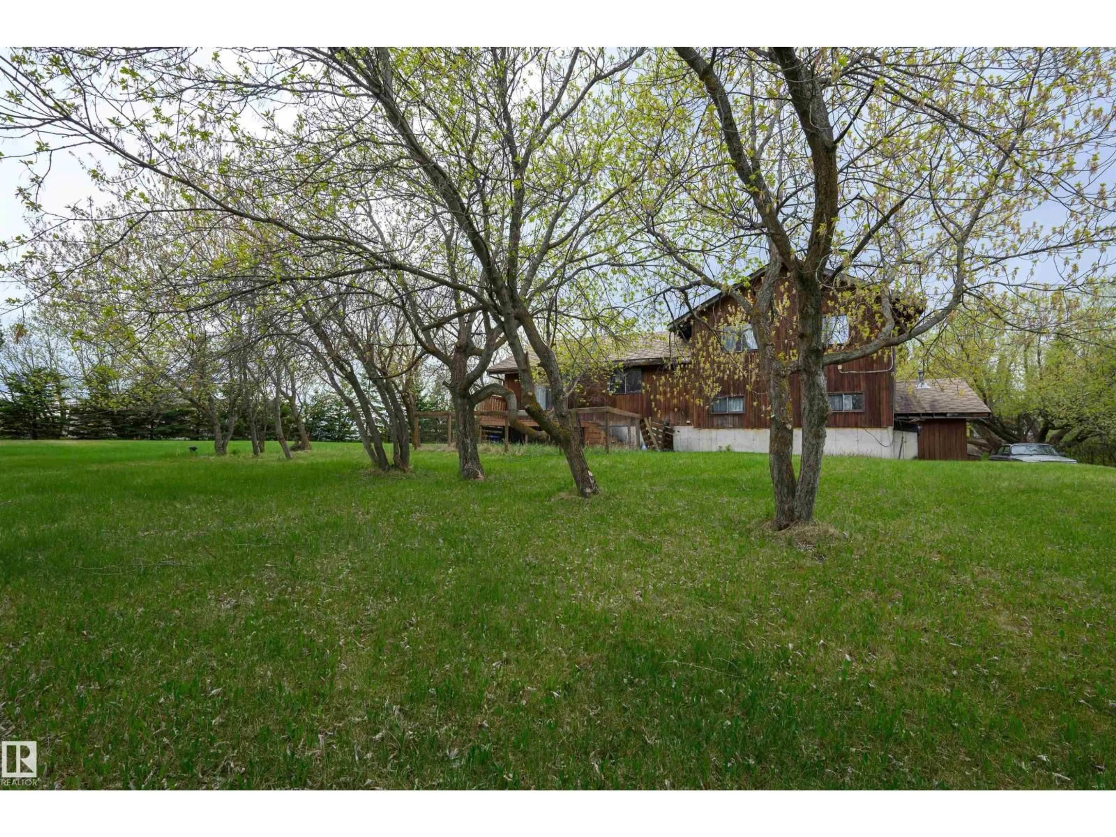 A pic from outside/outdoor area/front of a property/back of a property/a pic from drone, forest/trees view for #37 - 21032 TWP ROAD 540, Rural Strathcona County Alberta T8G2A6