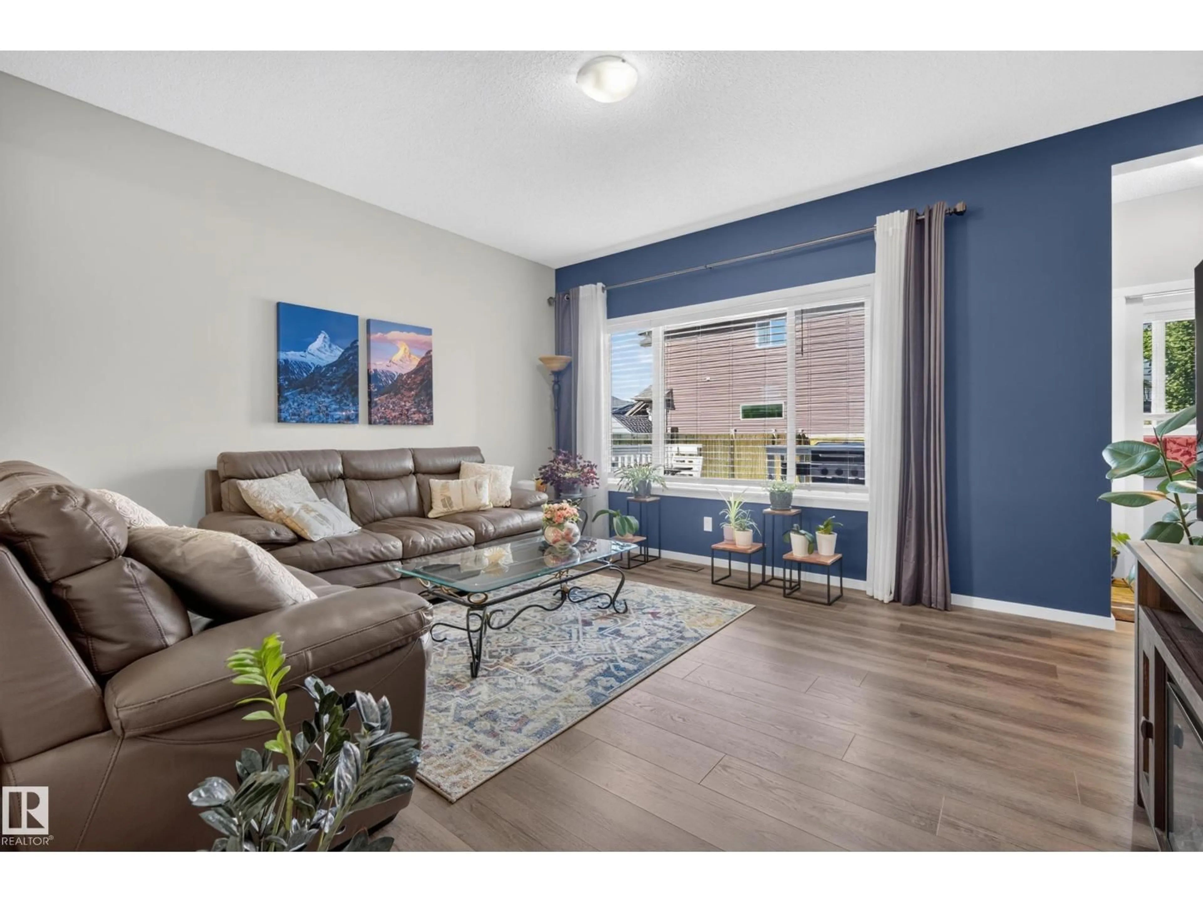 Living room with furniture, wood/laminate floor for 199 ABERDEEN CR, Sherwood Park Alberta T8H0Z1