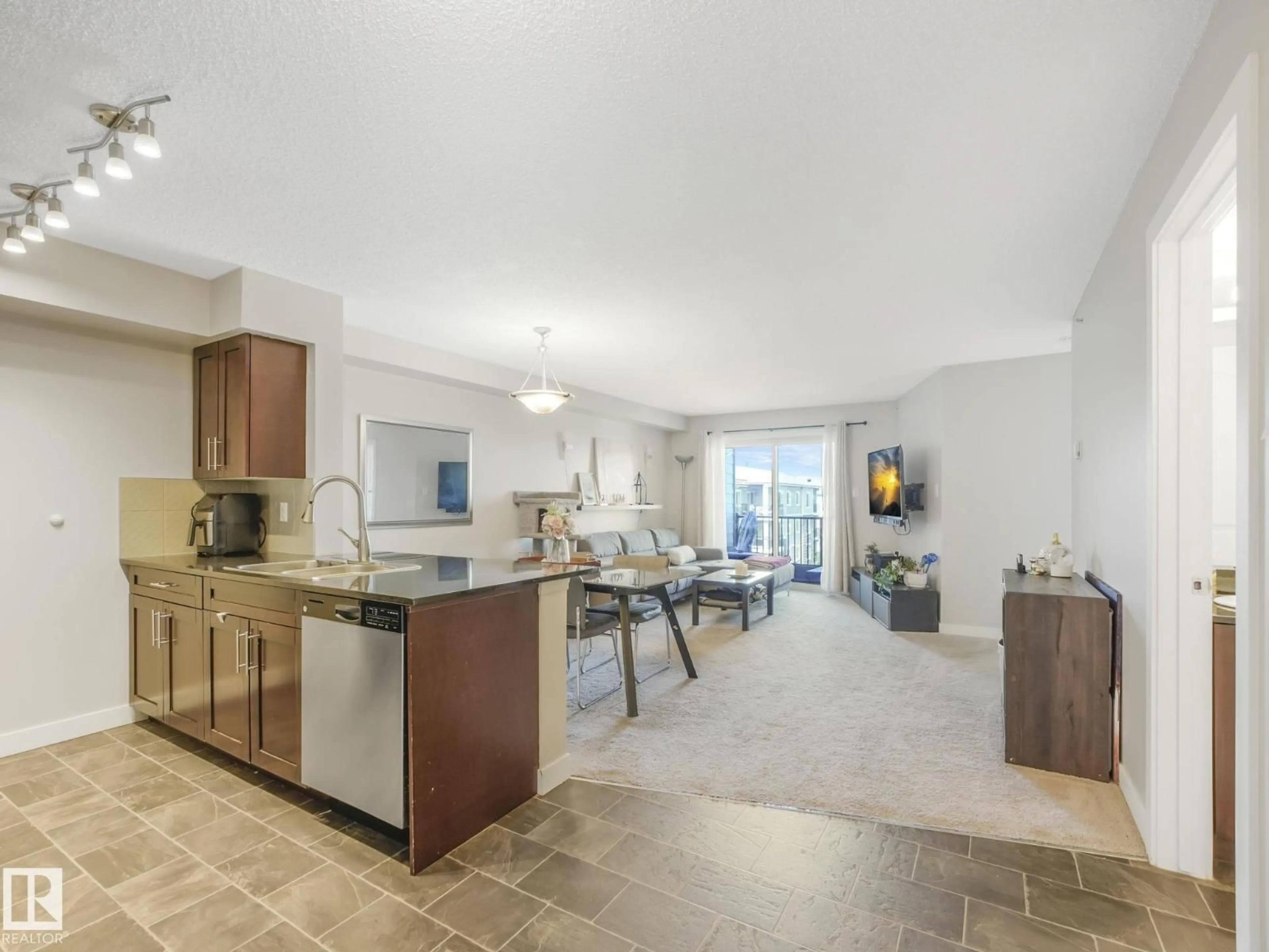 Open concept kitchen, ceramic/tile floor for 404 - 270 MCCONACHIE DR, Edmonton Alberta T5Y3N4