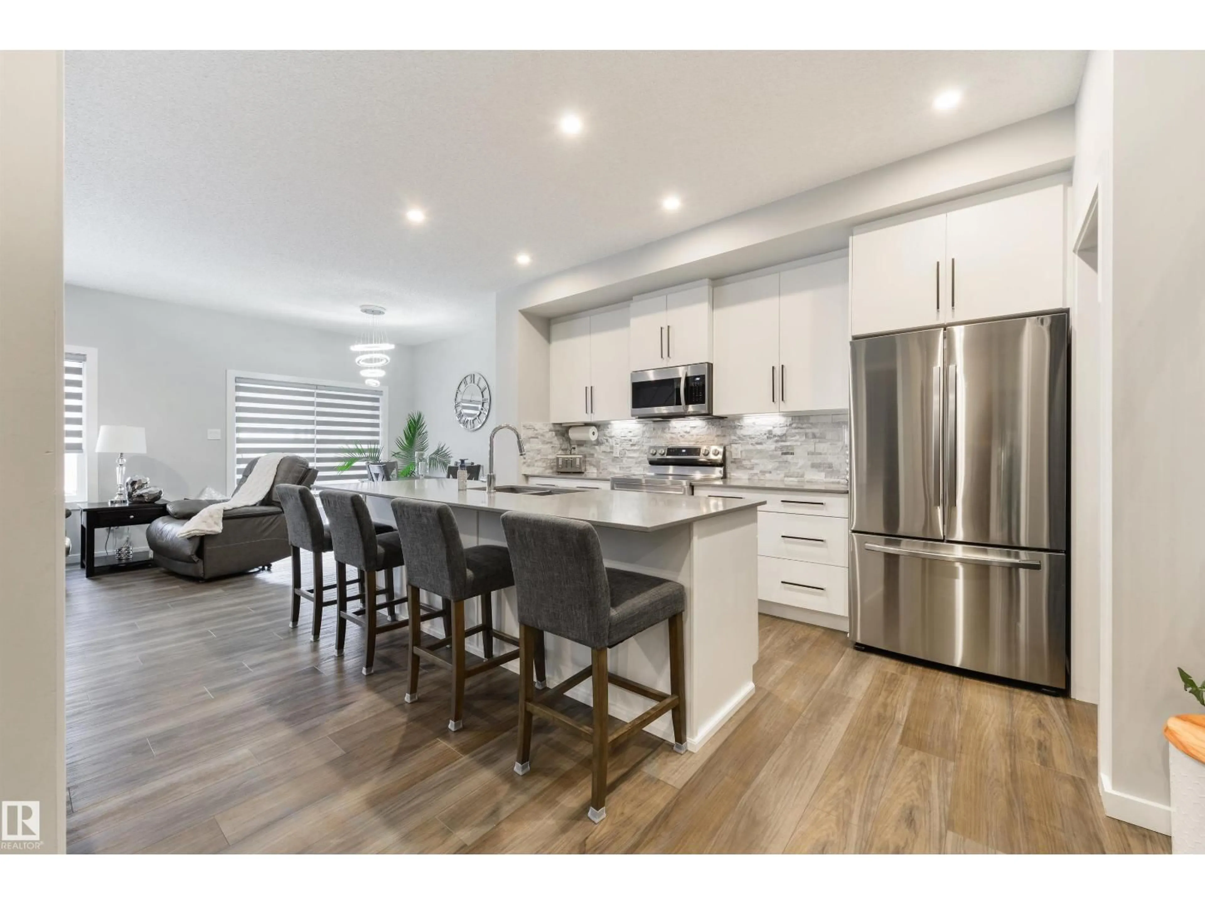 Open concept kitchen, wood/laminate floor for 27 PROSPECT PL, Spruce Grove Alberta T7X2W7